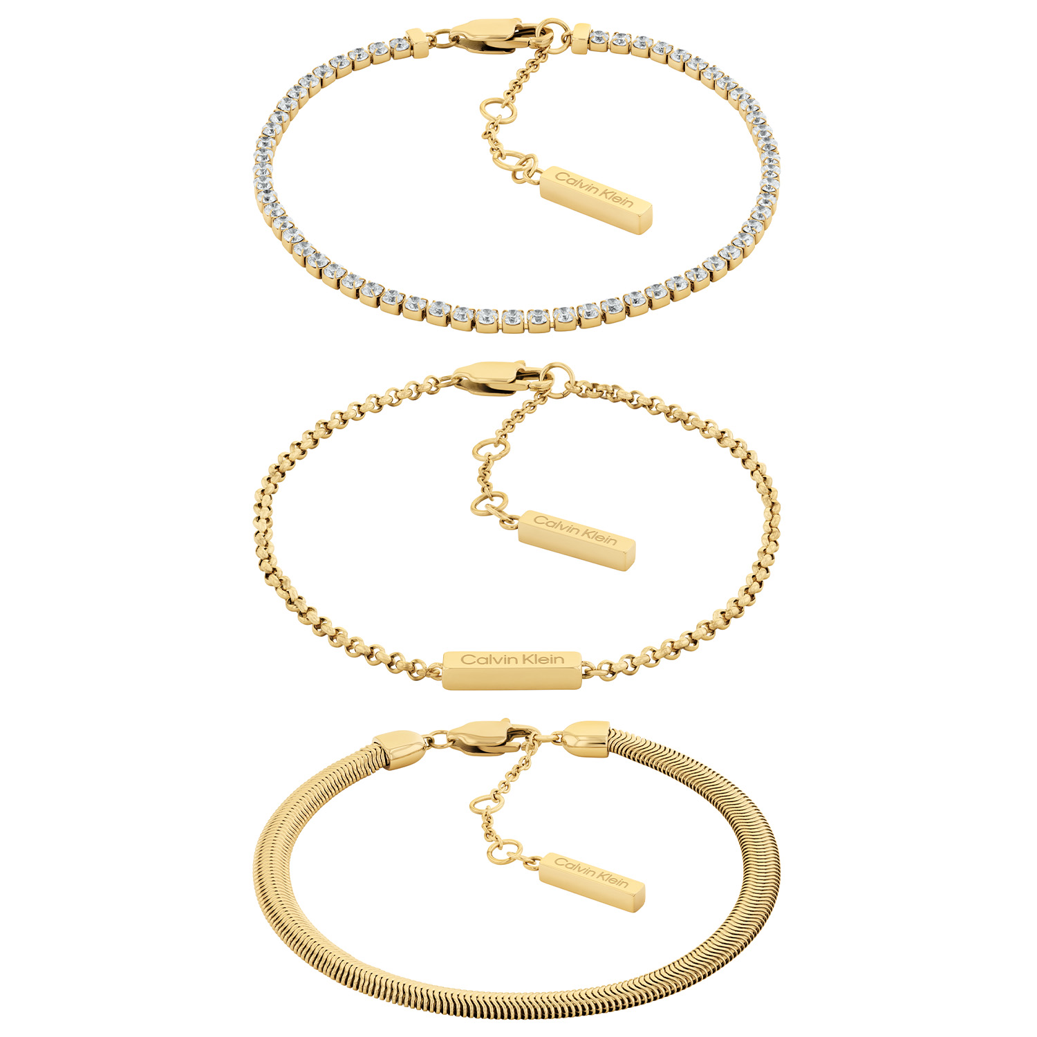 Calvin Klein CJ35000797 Dames Armbandset Staal goudkleurig Deze stalen dames armbanden van Calvin Klein met nr CJ35000797 zijn een musthave voor je collectie. De goudkleurige stalen set is zeer gevarieerd en bestaat uit 3 armbanden. Een slangenarmband, een tennisarmband en een fijne schakelarmband. Leuk te combineren met andere sieraden uit de serie van Calvin Klein. OVER CALVIN KLEIN Calvin Klein is een wereldwijd lifestylemerk dat gewaagde, vooruitstrevende idealen en een verleidelijke, vaak minimalistische, esthetiek nastreeft. Calvin Klein werd groot in de jaren 70 door haar mode- en merkjeans collecties. In de jaren 80 lanceerde Calvin Klein haar spraakmakende ondergoed dat uitdrukkelijk van logo &rsquo;s voorzien was. Vanwege het grote succes is het merk ook succesvol uitgerold in Accessoires, Parfums, Home, Brillen, Golf, Horloges en Sieraden. Sinds de oprichting in 1968 door Calvin Klein, heeft het merk haar reputatie opgebouwd als leider in de Amerikaanse mode, dankzij een cleane esthetiek en innovatieve ontwerpen. Calvin Klein wil haar publiek verleiden en inspireren door middel van provocerende beelden en opvallende ontwerpen die prikkelen. SPECIFICATIES: - Stalen dames armbandset - Slang, tennis en schakelarmband - Goudkleurig - Glimmend - 21cm