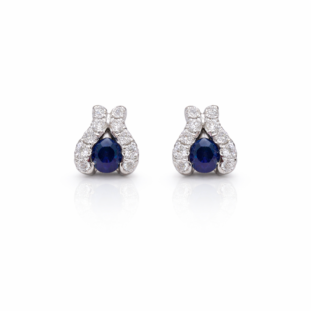 Briljant oorstekers 0.16crt G/SI met topaas