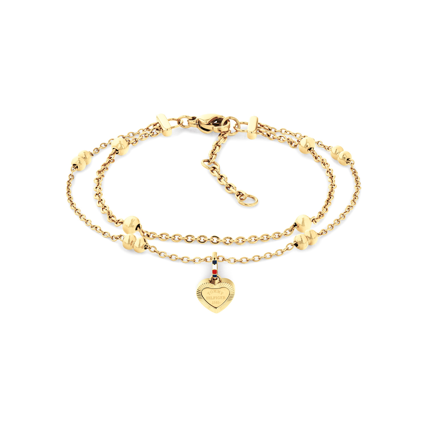 Deze Tommy Hilfiger laagjes  is een stijlvol en elegant sieraad met een speelse twist. De combinatie van twee fijne goudkleurige armbandjes zorgt voor een trendy gelaagde look, terwijl de hartvormige hanger een subtiel en betekenisvol detail toevoegt. Het verfijnde ontwerp maakt deze armband perfect voor zowel dagelijks gebruik als speciale gelegenheden. De damesarmband is verstelbaar heeft een totale lengte van 19cm. Leuk te combineren met andere sieraden uit deze serie.

Het merk:
Tommy Hilfiger is wereldwijd &eacute;&eacute;n van de grootste designer lifestyle merken en is internationaal bekend om haar classic American cool stijl. De sieraden zijn voor dames en heren met een eigen stijl, die niet bang zijn om dit aan de wereld te laten zien.

Specificaties:
- Dames armband
- Materiaal: Staal goudkleurig
- Lengte 19cm verstelbaar
- Ideaal als cadeau of voor jezelf
