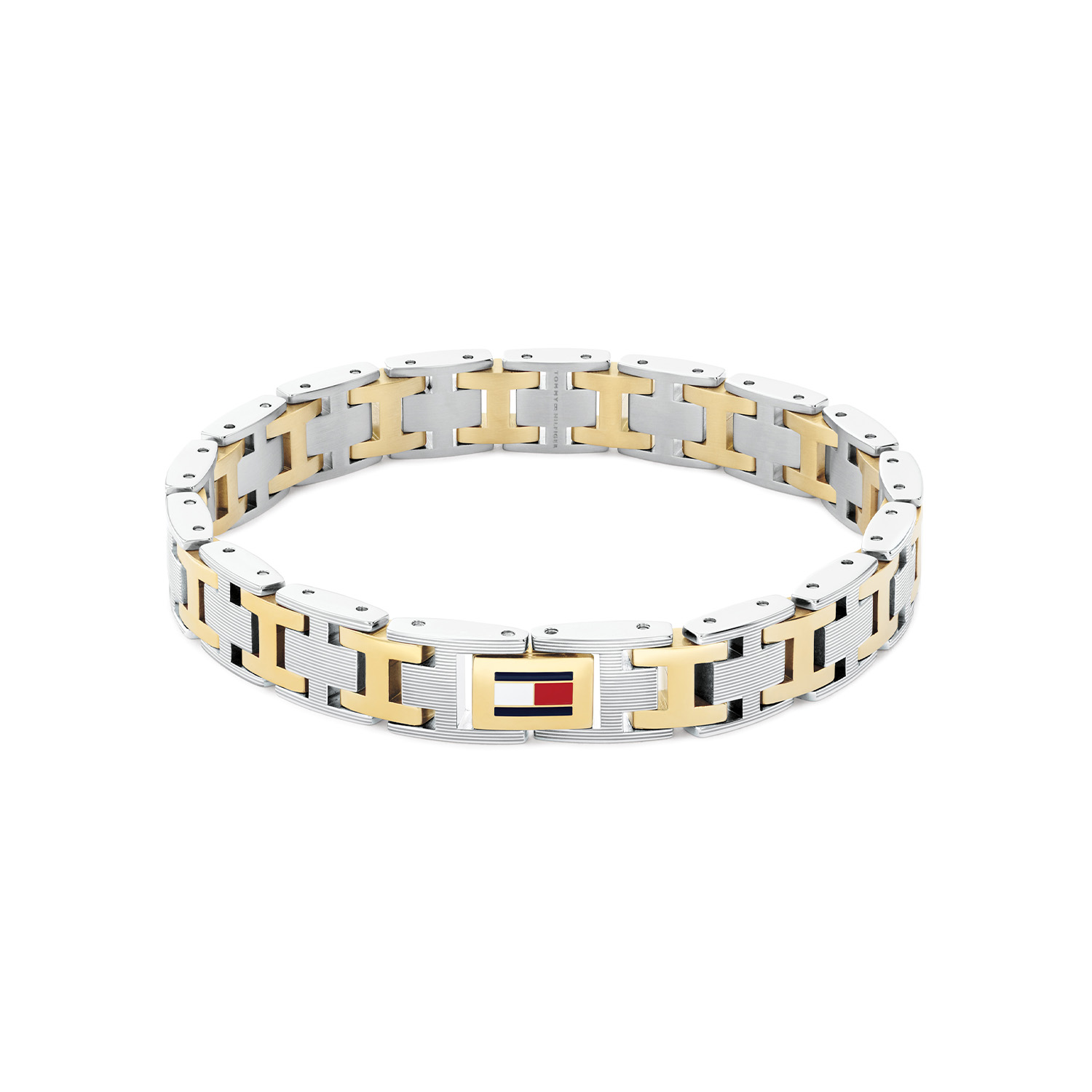 Geef je outfit een krachtige en stijlvolle uitstraling met deze originele Tommy Hilfiger bicolor stalen armband. Deze armband heeft grove schakels die zorgen voor een robuuste look, terwijl het hoogwaardige roestvrij staal een luxe en duurzame afwerking garandeert. Perfect voor de moderne man die houdt van een stoer, maar tijdloos accessoire. De armband is 19cm maar verstelbaar door schakels toetevoegen of te verwijderen, comfortabel om te dragen en eenvoudig te combineren met zowel casual als nette outfits. Het subtiele Tommy Hilfiger-logo geeft een herkenbare, premium touch zonder te overheersen.

Het merk:
Tommy Hilfiger is wereldwijd &eacute;&eacute;n van de grootste designer lifestyle merken en is internationaal bekend om haar classic American cool stijl. De sieraden zijn voor dames en heren met een eigen stijl, die niet bang zijn om dit aan de wereld te laten zien.

Specificaties:
- Heren armband
- Materiaal: Staal bicolor
- Lengte 19cm verstelbaar
- Ideaal als cadeau of voor jezelf