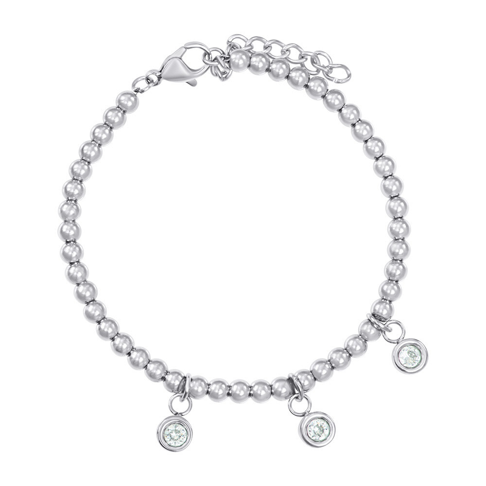 De iXXXi Armband &lsquo;Dot Topaz&rsquo; is gemaakt van stainless steel en bestaat uit goudkleurige kralen. In het midden van de armband zijn drie cups ingelegd met zirconia&rsquo;s in de kleur topaz, wat de armband een sprankelende en verfijnde uitstraling geeft.