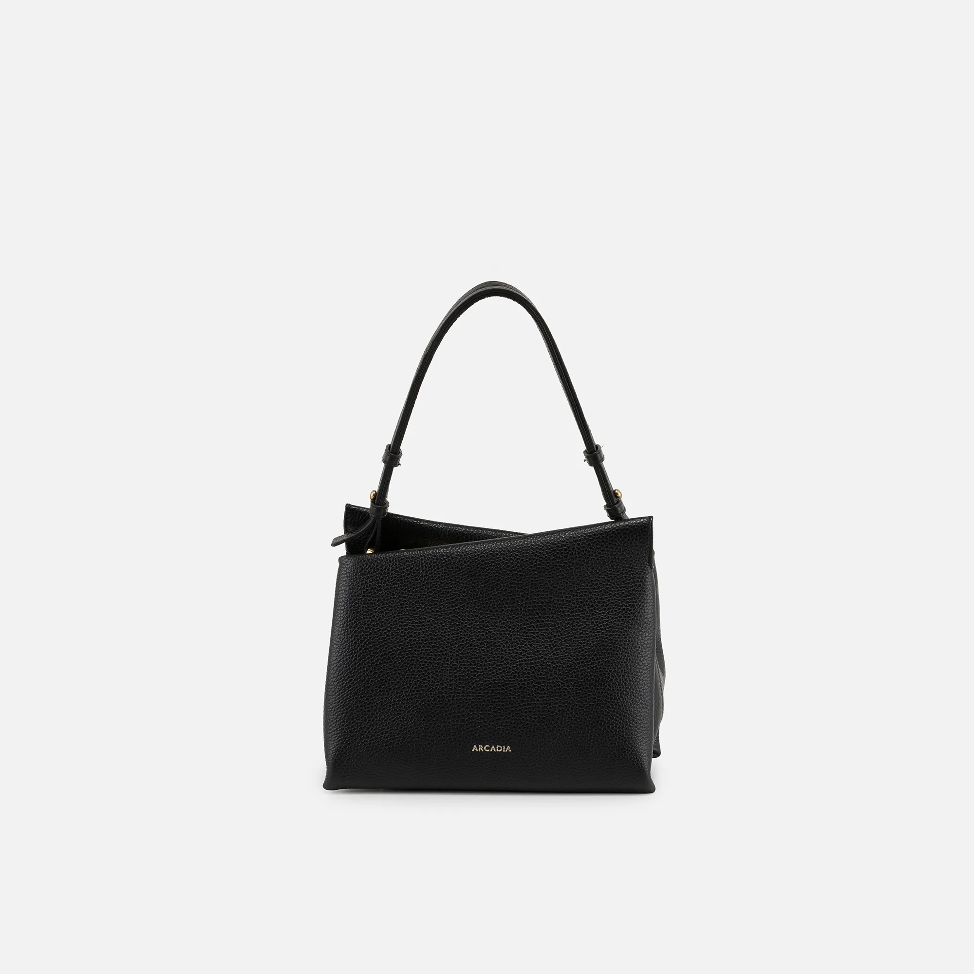 Gedurfde, asymmetrische lijnen defini&euml;ren de Arcadia Julia &mdash; een uitgesproken silhouet waarin avant-gardistisch design en verfijnde elegantie samenkomen. De tas is ontworpen voor dagelijks gebruik, met een perfecte balans tussen vorm en functionaliteit. De verstelbare schouderriem biedt veelzijdigheid en draagcomfort, waardoor de tas zich moeiteloos aanpast aan elke gelegenheid.

Details

Generfd kalfsleer
Handvatval: 16 cm
Magneetsluiting
Binnenvak met ritssluiting
Centraal compartiment met ritssluiting
Geborstelde metalen hardware
Voering met merklogo
Verstelbare schouderriem: 30&ndash;60 cm
Gemaakt in Itali&euml;

Afmetingen
L 26 &times; H 22 &times; D 13 cm