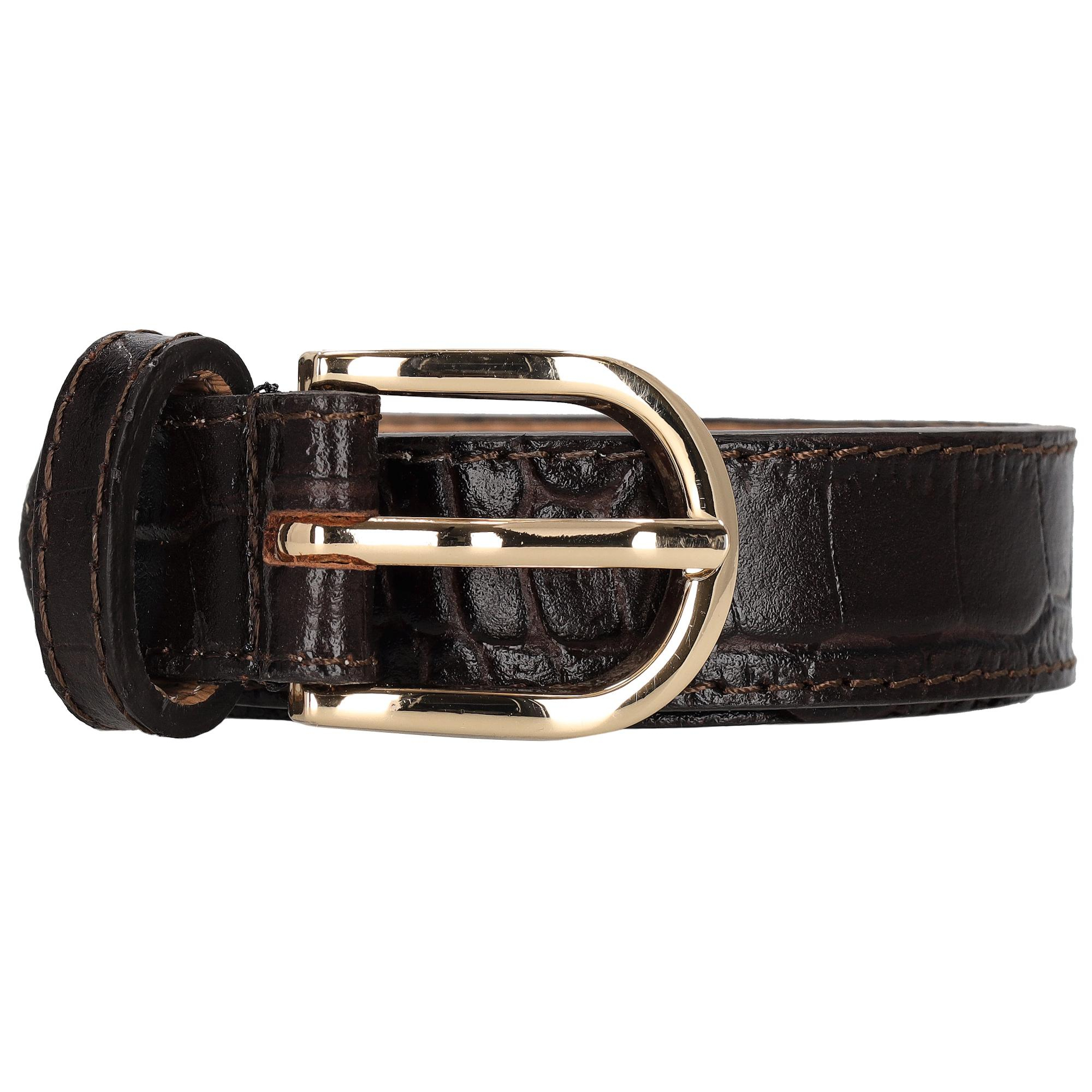 De Charm London Milaan Riem - 097 Donkerbruin is een stijlvolle accessoire, perfect voor het complementeren van elke outfit. Ideaal als broekriem, deze riem is een accessoire voor elke garderobe. Combineer met jeans of chino's voor een verfijnde look. Perfect voor zowel casual als formele gelegenheden, en voegt een vleugje elegantie toe.