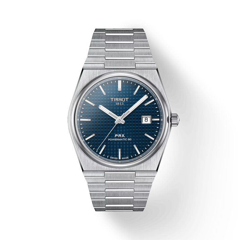 De Tissot PRX T1374171104100 is een elegante polshorloge met een zilverkleurige roestvrijstalen kast en band, blauwe wijzerplaat met strokenindex en saffierglas. Het horloge bevat een datumfunctie, is waterbestendig tot 100 meter en nikkelvrij. Ideaal om dagelijks te dragen voor een verfijnde, moderne uitstraling. Geschikt voor zowel formele als casual gelegenheden.
