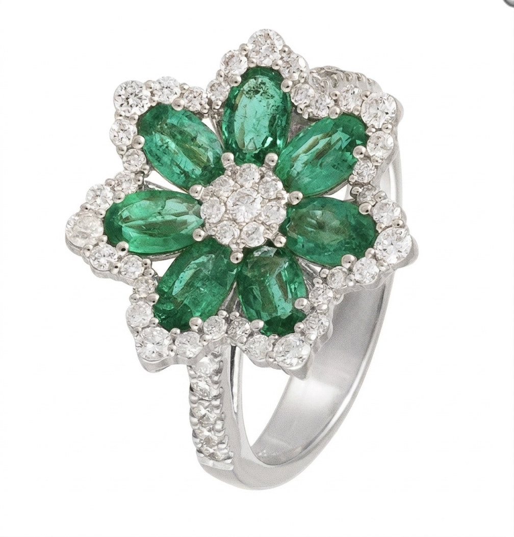 Deze prachtige 18 karaat witgouden ring straalt luxe uit met een ovale smaragd van 1,63 karaat en een elegante natuur diamanten. Het is een tijdloos juweel, perfect voor speciale gelegenheden. Draag deze ring om de ringvinger als een statement stuk dat elke outfit compleet maakt. Ideaal voor liefhebbers van verfijnde elegantie.