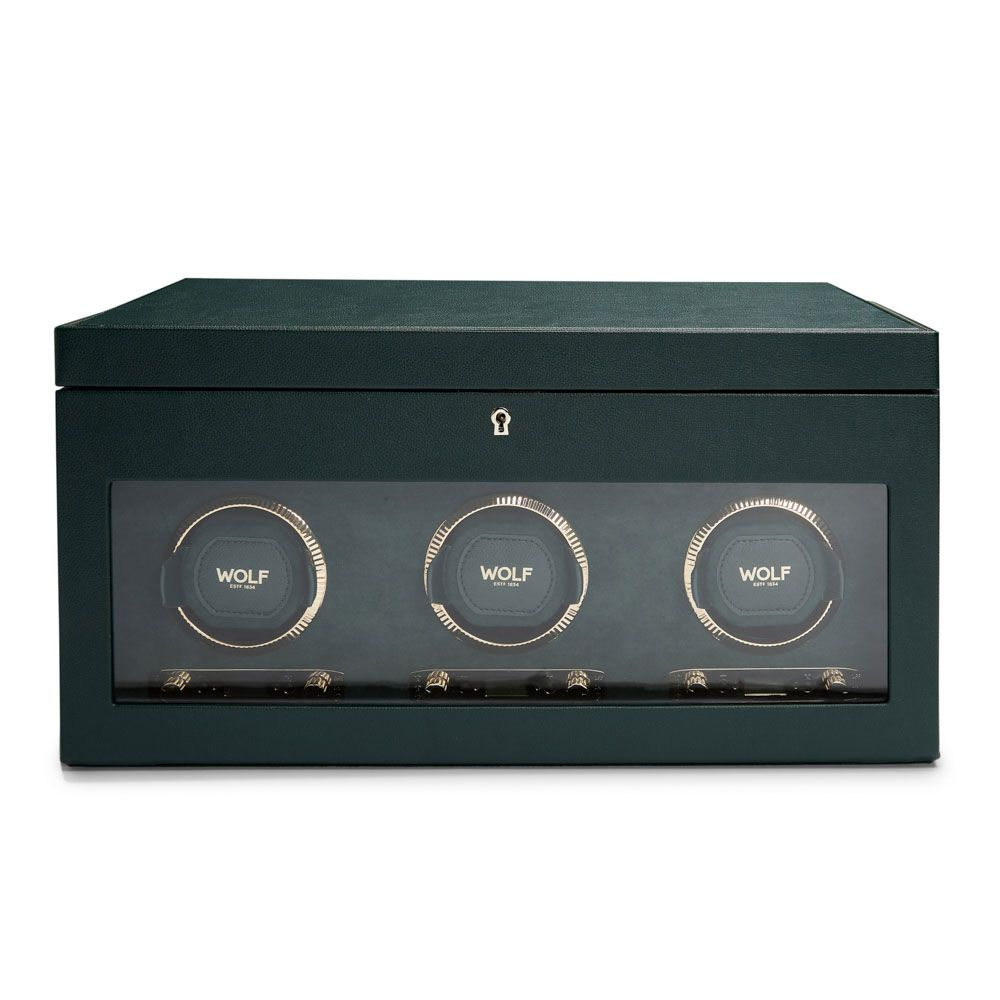 De British Racing Triple Watch Winder, modelnummer 792341, biedt een stijlvolle oplossing om drie automatische horloges op te winden. Met extra opbergruimte voor accessoires, is het een essentieel accessoire voor horlogeliefhebbers. Plaats uw horloge veilig in de winder voor optimale werking. Perfect voor op het dressoir of in de kast. Voeg luxe en gemak toe aan uw horlogecollectie.