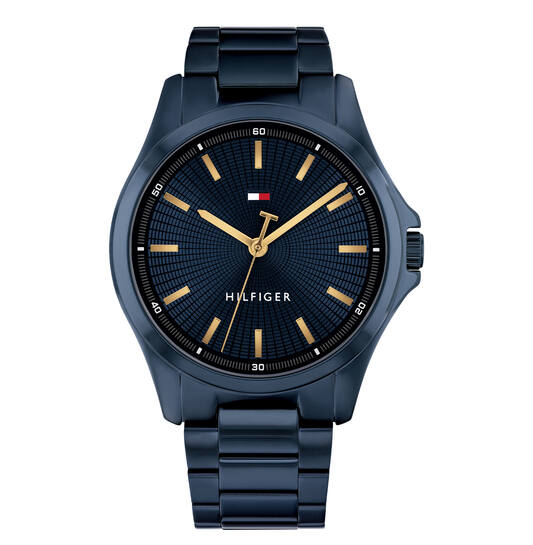 Het Tommy Hilfiger herenhorloge Bruce (modelnummer 1710742) heeft een stijlvol design met een blauwe polsband en een roestvrijstalen kast. Het ronde horloge heeft een mineraalglas en een kwartsuurwerk zonder datumaanduiding. Perfect voor een casual look. Draag het horloge op kantoor of tijdens een informele bijeenkomst voor een verfijnde en moderne uitstraling.
