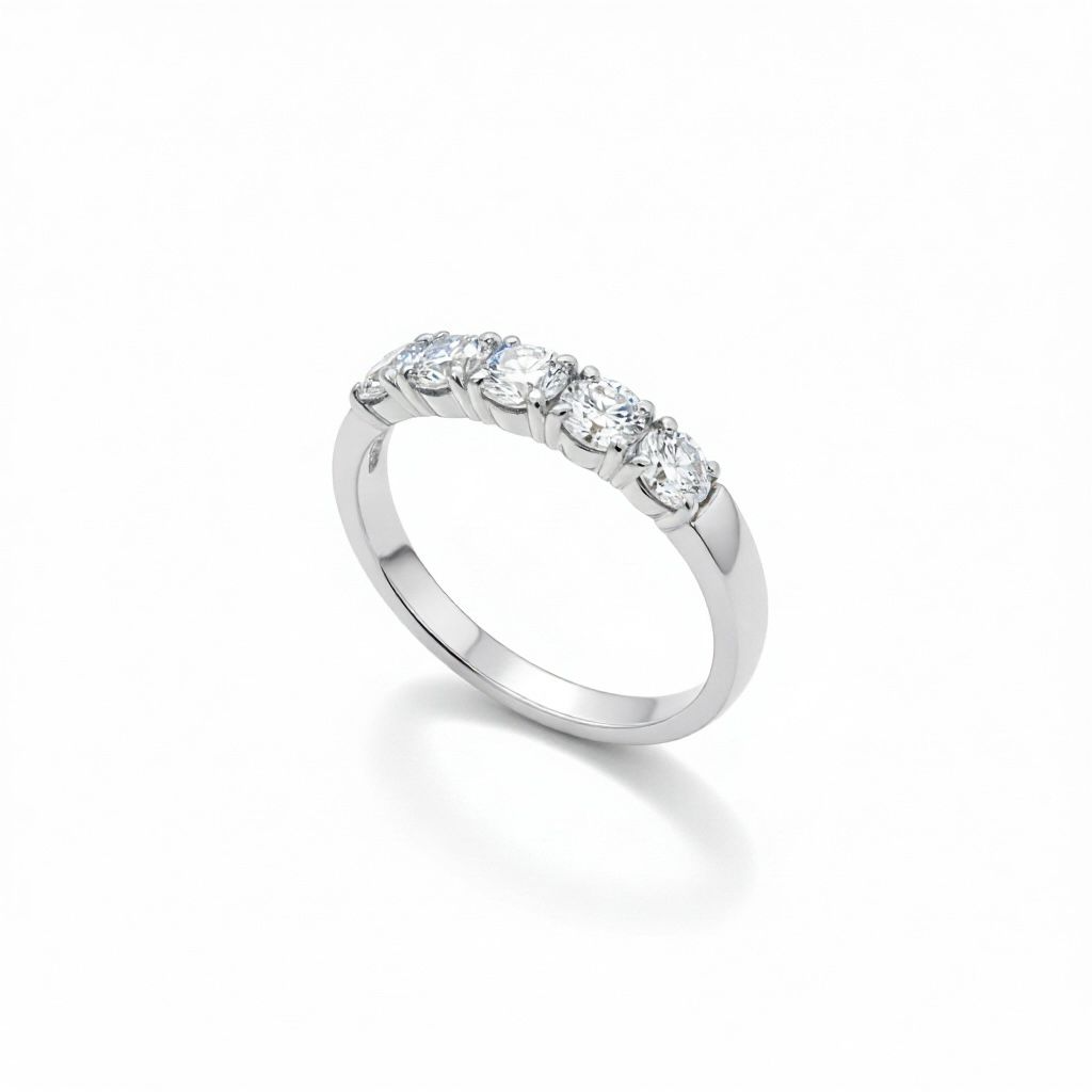 14 karaat witgouden memoire ring met 5 briljanten van totaal 0.48 caraat.