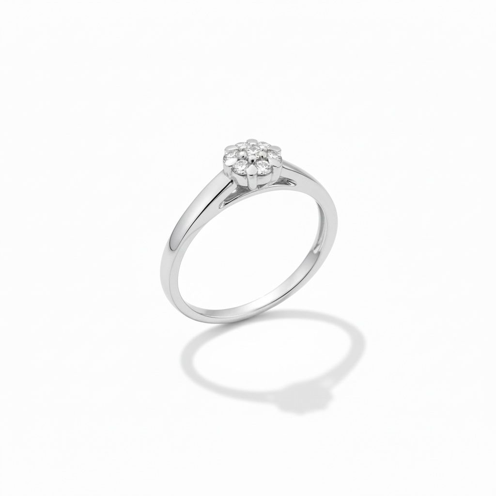 14 karaat witgouden ring met 7 briljant geslepen diamanten van totaal 0.10 caraat.