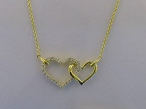 Der Collier Silber GP Herze Zirkonia, Modellnummer 216/195512/45, ist ein elegantes Schmuckst&uuml;ck mit funkelnden Zirkonia-Steinen in Herzform. Dieser Schmuck geh&ouml;rt zur Kategorie NECKLACE und verleiht jedem Outfit einen Hauch von Glamour. Tragen Sie ihn zu formellen Anl&auml;ssen oder als elegantes Alltagsaccessoire, um Ihrem Look das gewisse Etwas zu verleihen.
