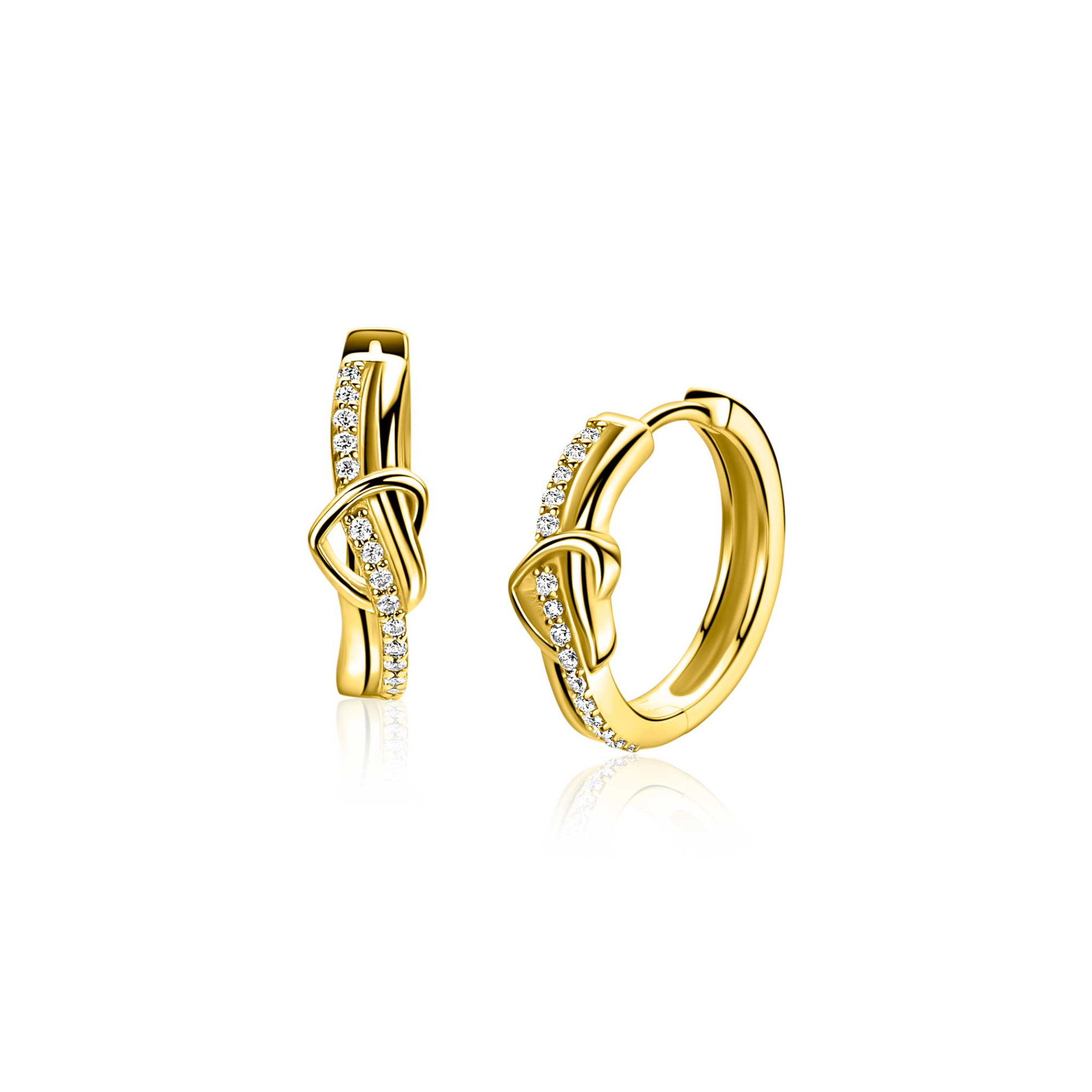 De ZINZI zlv. oorringen met modelnummer ZIO2874Y zijn stijlvolle creolen, verguld met goud en versierd met hartvormige zirconia's. Gemaakt van nikkelvrij 925 sterling zilver, stralen ze met een prachtige glans. De klapscharnier sluiting zorgt voor eenvoudig dragen. Deze nieuwe juweeltjes geven elke outfit een verfijnde gouden touch en zijn ideaal voor zowel dagelijks als feestelijk gebruik.
