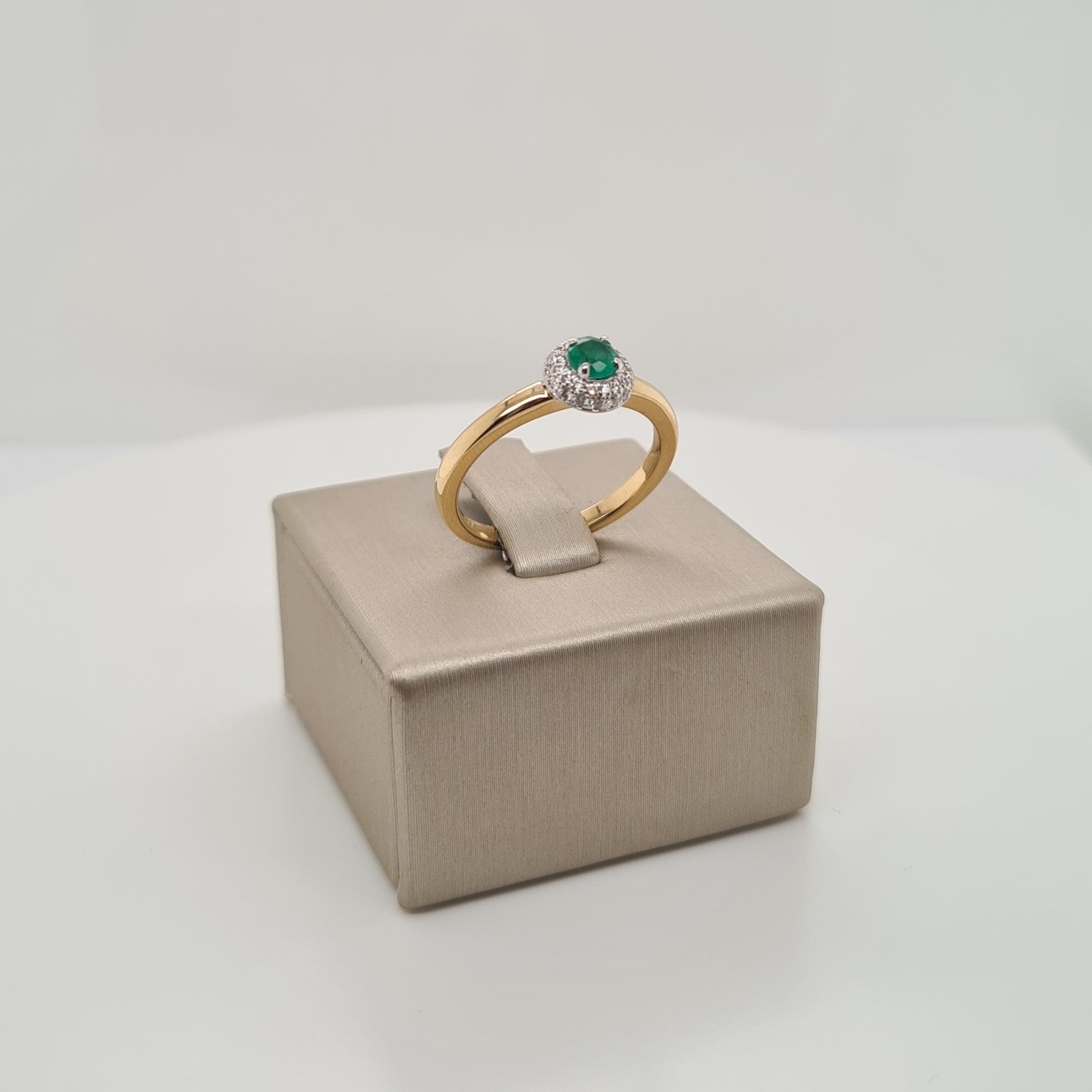 14krt gouden ring met diamant en smaragd