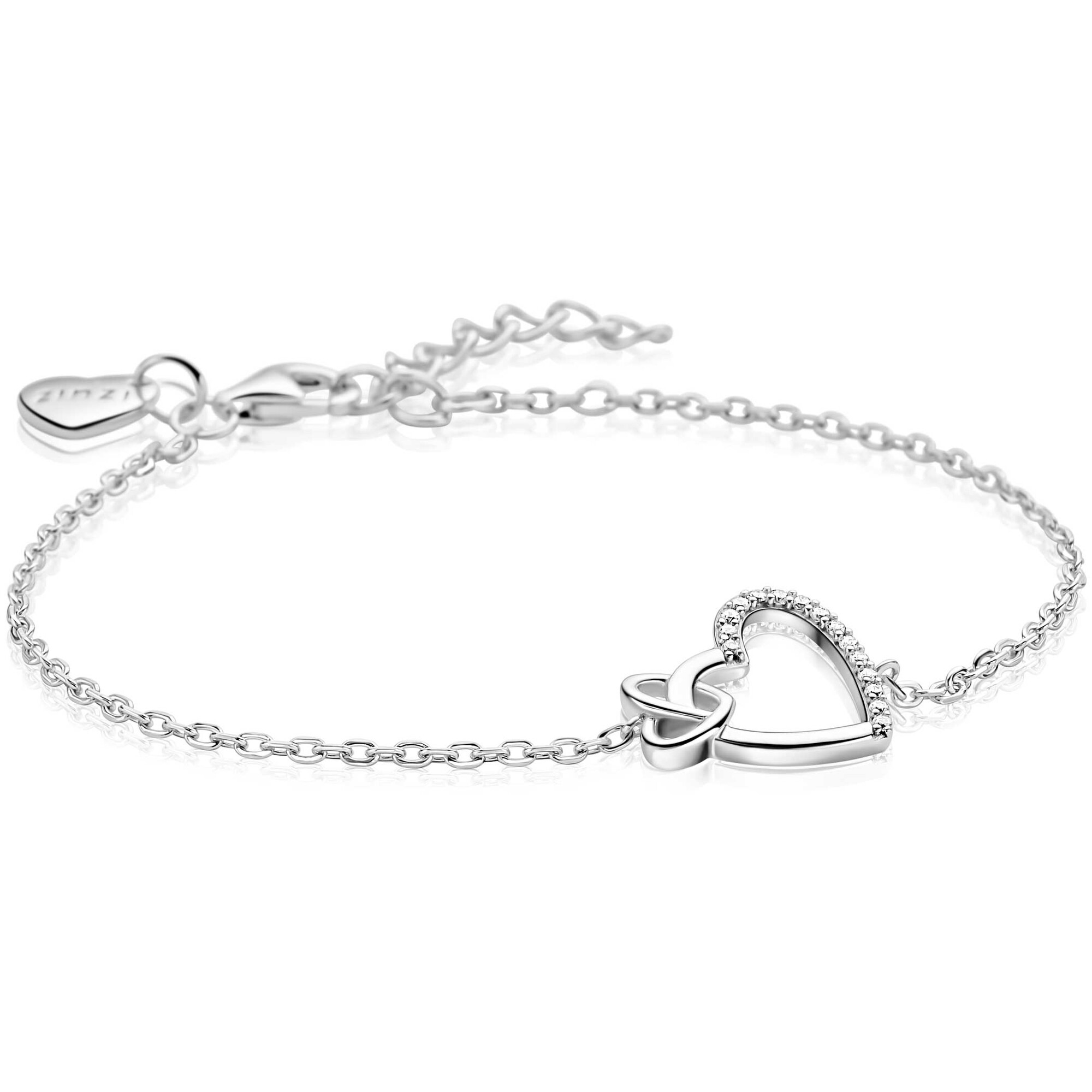 De ZINZI ZLV armband  heeft twee met zirkonia ingelegde verbonden harten. Deze nikkelvrije fantasiearmband valt onder de categorie juwelen. Voor een stijlvolle look, draag het solo of gecombineerd met andere subtiele sieraden. Perfect voor dagelijks gebruik of speciale gelegenheden. Voeg een vleugje romantiek toe aan elke outfit!