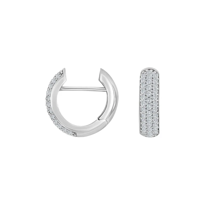 Deze Heide Heinzendorff "Lara" oorringen, zijn stijlvolle creolen van 16x5mm. En zijn perfect voor dagelijks gebruik of speciale gelegenheden. Combineer ze met elegante avondkleding of casual outfits voor een verfijnde look. De oorringen kunnen los gedragen worden of met bijpassende hangers.