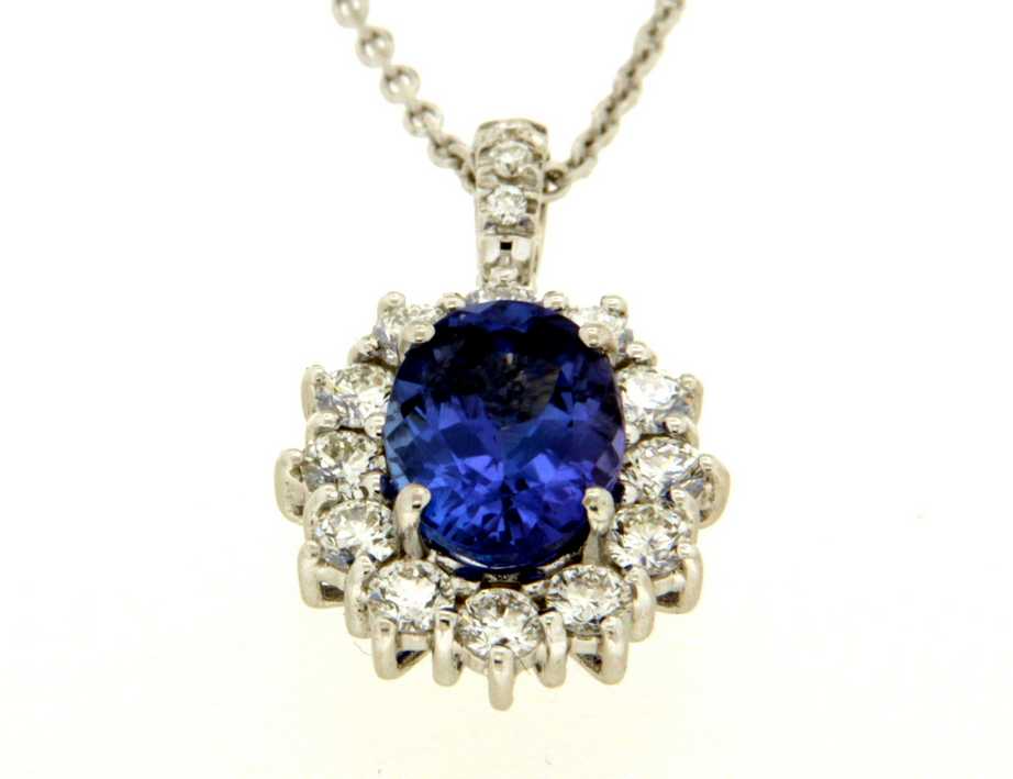 Exclusieve Giorgio Visconti ketting in 18 karaat goud, verfijnd afgewerkt tanzaniet en witte diamanten met een elegante hanger. Een tijdloos en luxueus design met Italiaanse finesse en schittering.