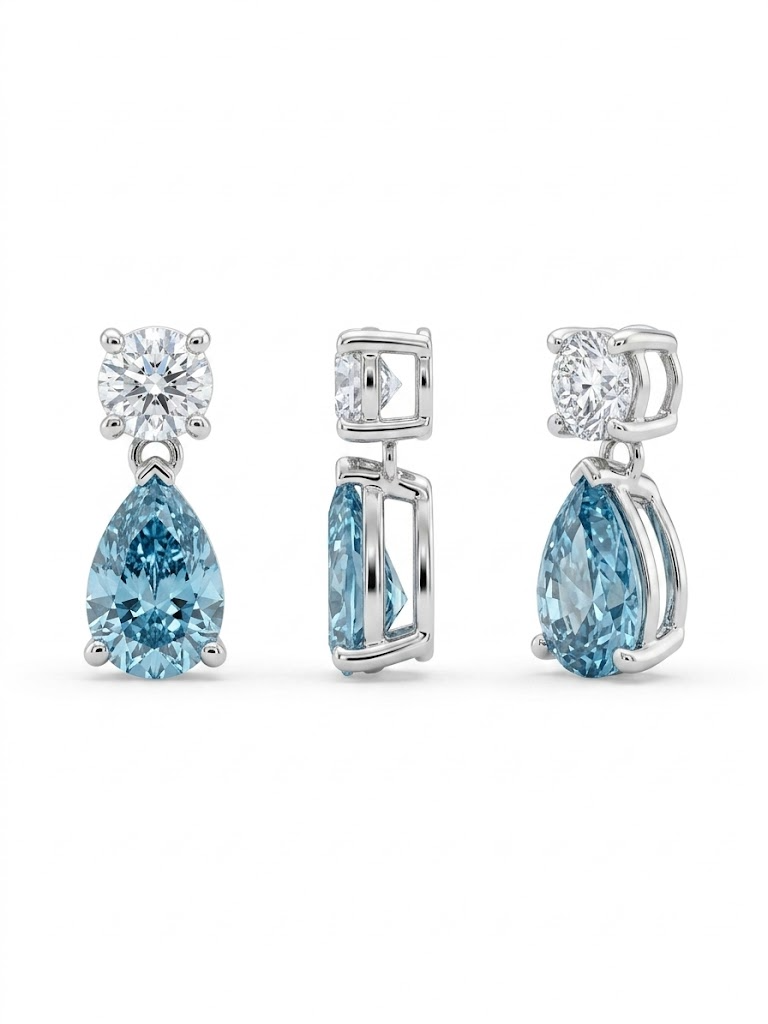 Eigen creatie hanger in 18kt WG met lab grown diamant 1.33ct 
de mooie blauwe diamant in peer vorm geslepen wordt goed versterkt met een D/LC witte briljant