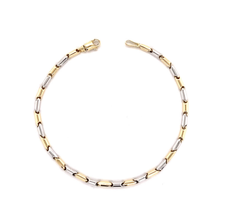 De Van Mechelen gouden armband, is een elegante armband met een lengte van 190 mm. Gemaakt van 14-karaats goud, schittert deze in een goud-zilver tint. Ideaal om te dragen als stijlvol accessoire bij zowel formele als informele gelegenheden. Voeg een vleugje klasse toe aan je pols!