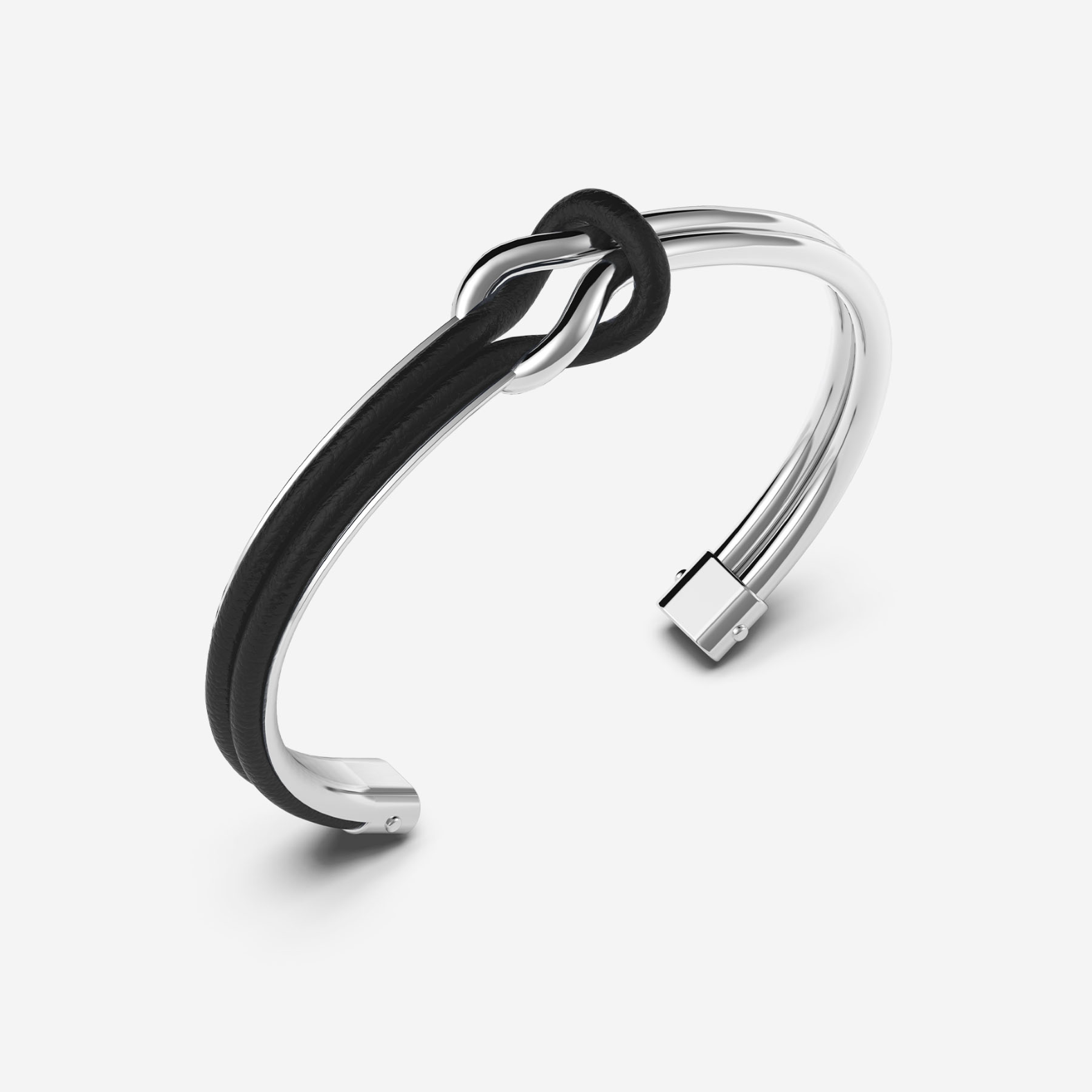 Het Pianegonda Klemarmband Foedus - Zilver & Leder - PFOB09B is een verfijnd sieraad dat schittert met zijn zilverkleurige slavensieraadontwerp. Gemaakt van 925 sterling zilver en leder, biedt het een tijdloze elegantie. Ideaal om te dragen als opvallend accessoire op een speciaal evenement. Voeg een vleugje verfijning toe aan elke outfit met dit prachtige nieuwe juweel.
