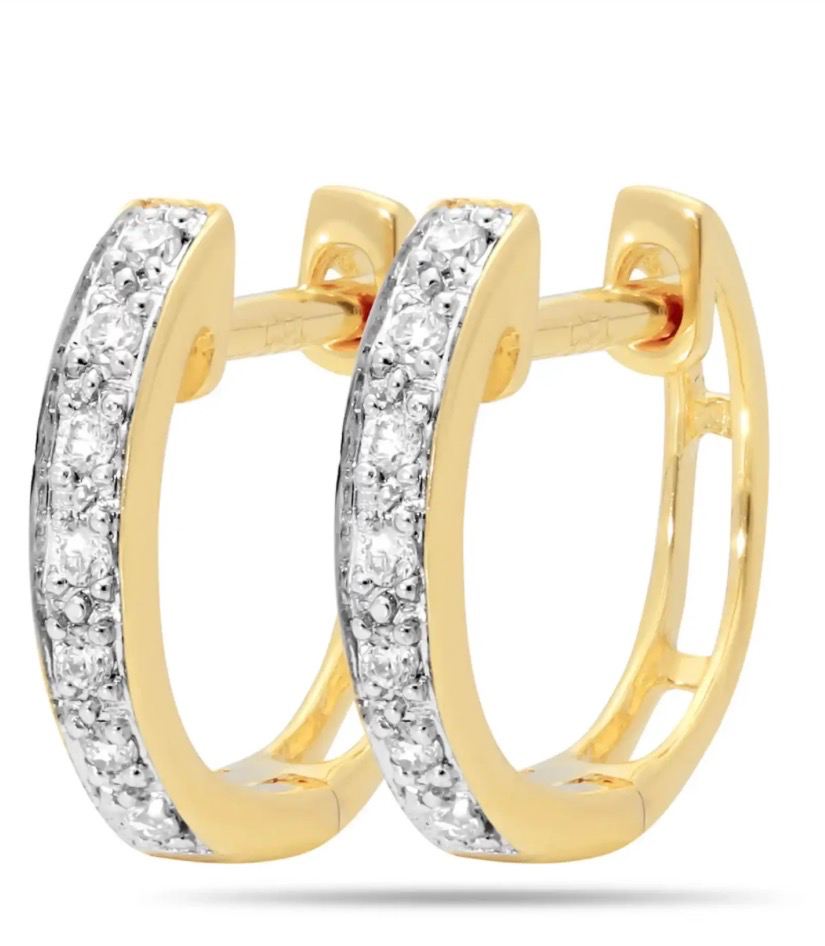gemaakt van 14 karaat geelgoud, witgouden zetting. Bezet met natuurlijke diamanten. 0.07 CT H/SI