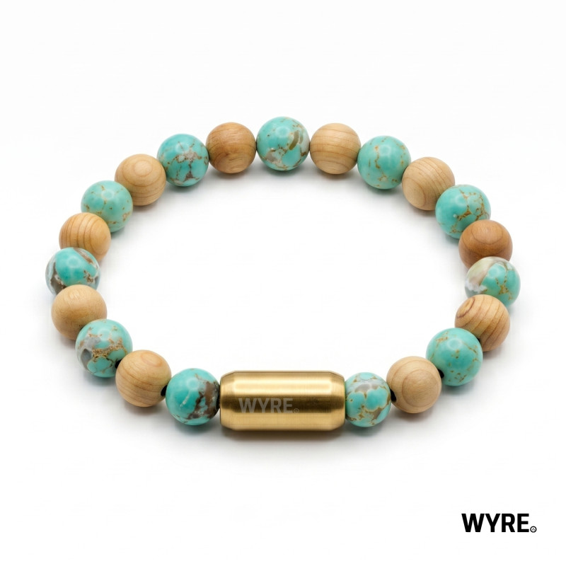 De Perfecte Balans tussen Natuur en Kracht
Maak kennis met de WYRE Azure Earth, een armband die ontworpen is voor wie houdt van een natuurlijke uitstraling zonder in te leveren op kwaliteit. Deze armband combineert de levendige, oceaanblauwe tinten van turquoise met de warme, aardse textuur van natuurlijke houten kralen.

Of je nu een casual outfit draagt of je look een verfijnd accent wilt geven, de Azure Earth past zich moeiteloos aan. Het is meer dan een sieraad; het is een statement van karakter en duurzaamheid.

aar veel kralenarmbanden kwetsbaar zijn door elastiek of dunne draad, gaat WYRE een stap verder. De Azure Earth is opgebouwd rond een interne metalen draad. Dit maakt de armband nagenoeg onbreekbaar en zorgt ervoor dat hij zijn vorm behoudt, hoe vaak je hem ook draagt.

Geen gedoe meer met lastige slotjes. Dankzij de hoogwaardige, sterke metalen magneetsluiting doe je de armband in een handomdraai om en af. De sluiting is niet alleen functioneel, maar vormt met zijn strakke mat gouden/messing finish ook een prachtig modern contrast met de natuurlijke kralen.

✓ Unisex
✓ 8mm natuur en houten stenen
✓ Stevige, stainless steel magnetische sluiting.
✓ Handgemaakt in Nederland.
✓ Inclusief metalen luxe WYRE travel/cadeau case.
