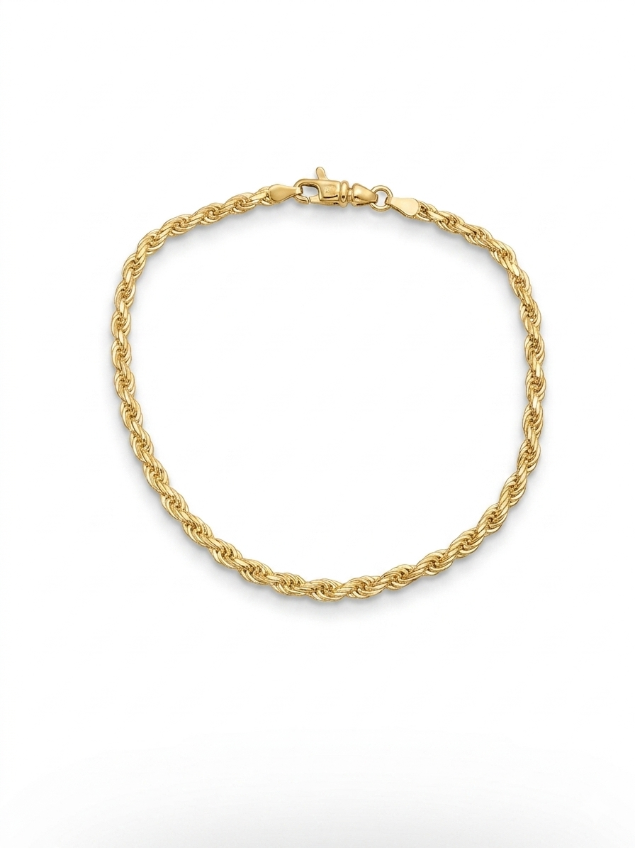 De 14 karaat massief gouden rope chain armband, modelnummer ROPE-JRS, straalt luxe uit. Gemaakt van goud met een gewicht van 10 gram, is deze gouden armband nieuw en trendy. Met een lengte van 21 cm past hij perfect om de pols en voegt hij glamour toe aan elke outfit. Ideaal om stijlvol gedragen te worden bij zowel formele als casual gelegenheden.