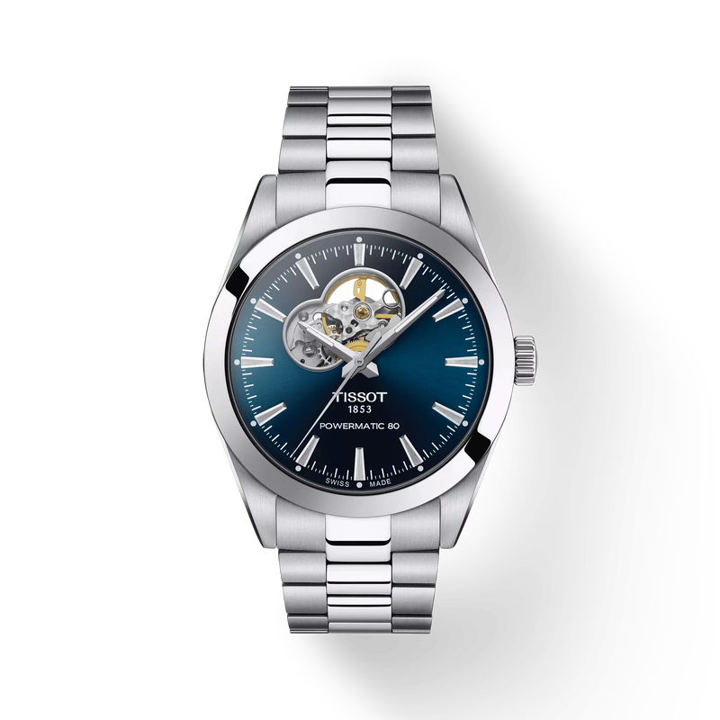 De Tissot Gentleman Powermatic Open Heart T1274071104101 is een luxe herenhorloge met een automatisch Zwitsers uurwerk. Dit model heeft een stijlvolle blauwe wijzerplaat, een roestvrijstalen behuizing en band, en is waterdicht tot 10 bar. Perfect om dagelijks te dragen. Combineer met zakelijke en casual outfits voor een tijdloze uitstraling. 