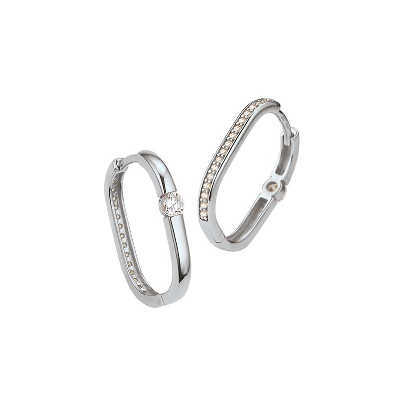 Creolen Silber rhodiniert 925 mit der Modellnummer 5-216277-001 sind stilvolle Ohrringe aus 925er Sterlingsilber. Perfekt f&uuml;r einen eleganten Look, lassen sie sich einfach an- und ablegen. Tragen Sie sie idealerweise zu festlichen Anl&auml;ssen oder um Ihrem Alltagsoutfit einen Hauch von Eleganz zu verleihen. Ein zeitloses Accessoire f&uuml;r jede Gelegenheit.