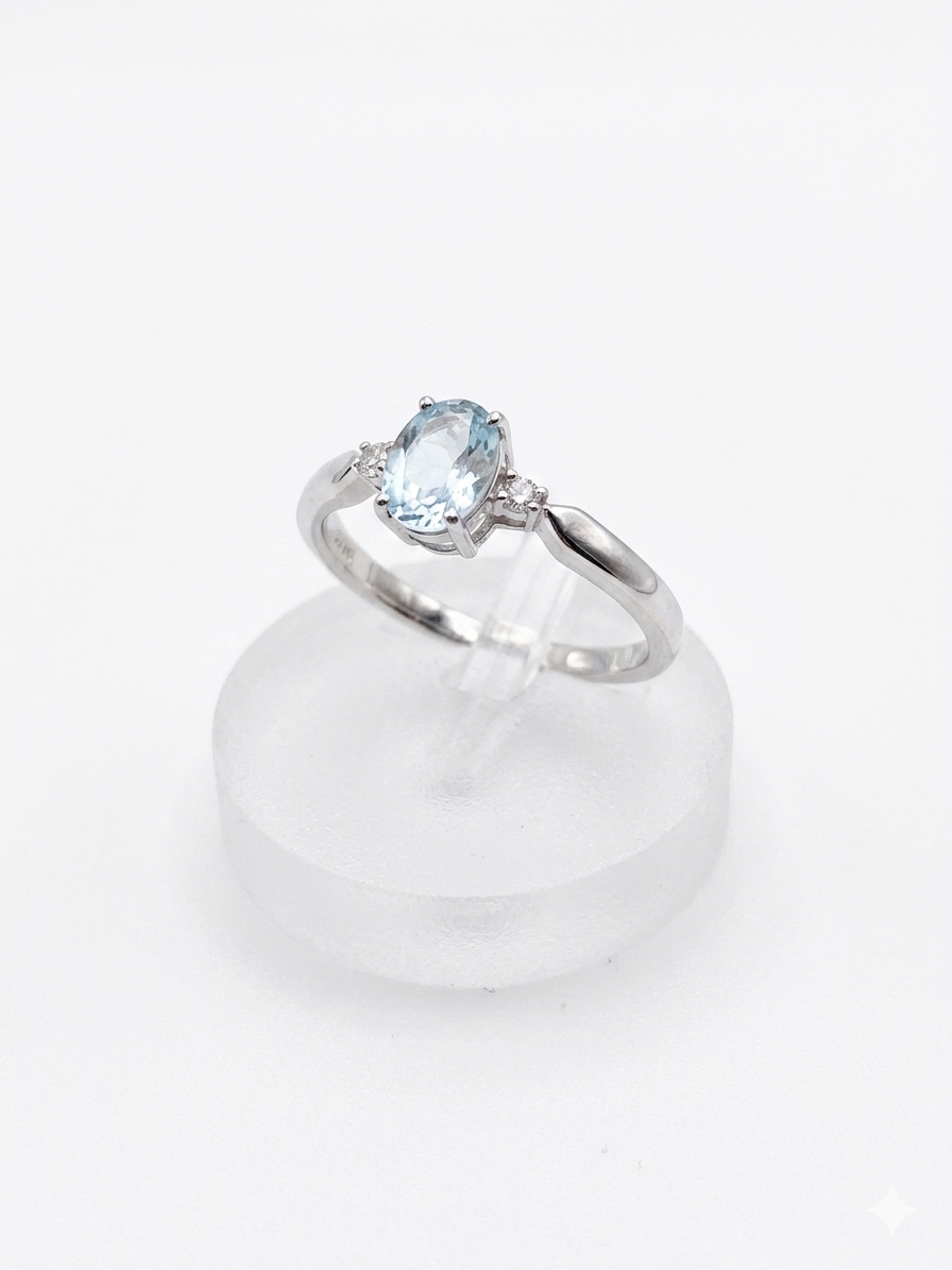 Witgoud ring aquamarijn 1.00crt + diamant 0.06 crt WE-SI maat 17.5