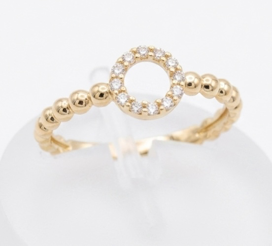 Goud ring met rondje zirkonia's maat 16