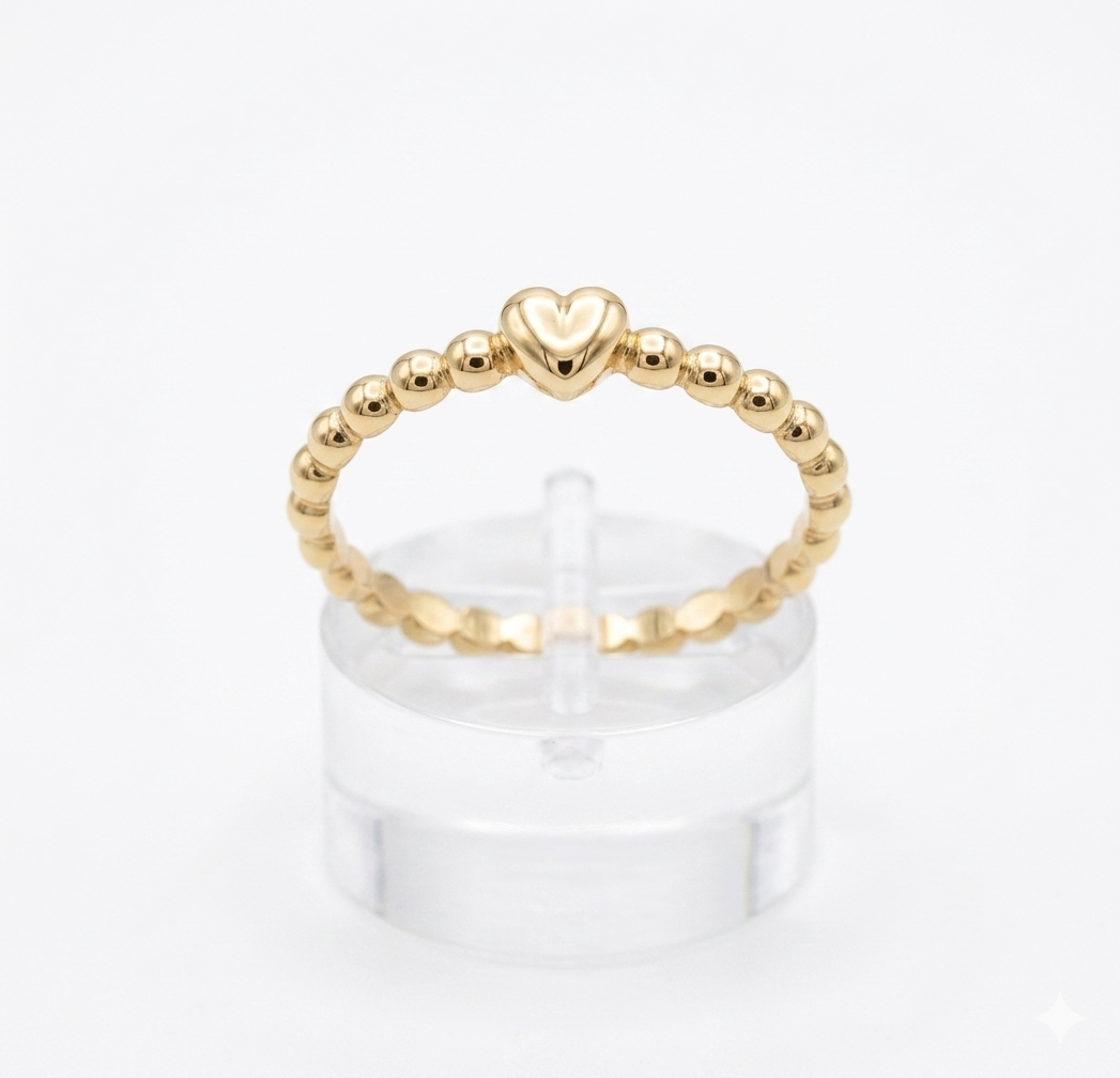 Goud ring met bolletjes en hartjes maat 15 3/4