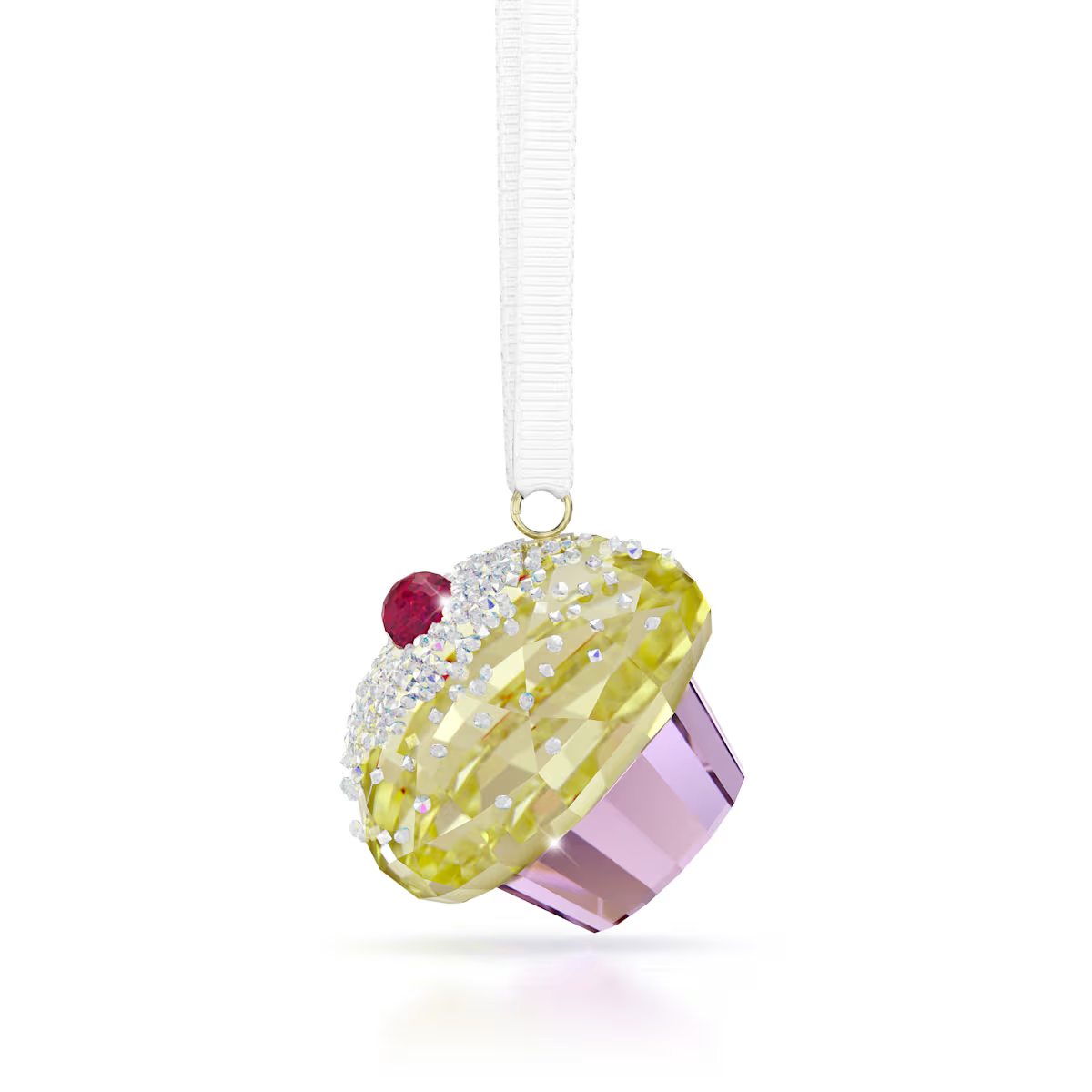 Vers uit de kerstkeuken van Swarovski: dit geel met roze cupcake-ornament is vervaardigd met 213 facetten en versierd met een vleugje Ultra Fine Rocks in het iriserende Aurore Boreale-effect. Een felrode kristallen kers geeft deze gastronomische creatie de perfecte finishing touch. Decoratief voorwerp. Geen speelgoed. Niet geschikt voor kinderen jonger dan 15 jaar.
