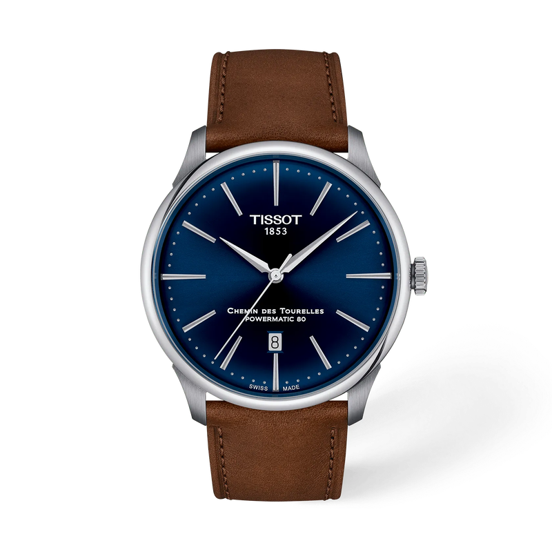 Dit Tissot Chemin Des Tourelles horloge heeft een zilveren roestvrijstalen kast en band, met een klassieke blauwe wijzerplaat en bruine leren band. Het heeft functies zoals chronograaf en datumweergave. Draag dit horloge met formele of casual outfits voor een klassieke en trendy uitstraling. Combineer het met zilveren sieraden voor een geco&ouml;rdineerde look. Stijlvol en tijdloos, dit horloge is een must-have accessoire voor elke gelegenheid.