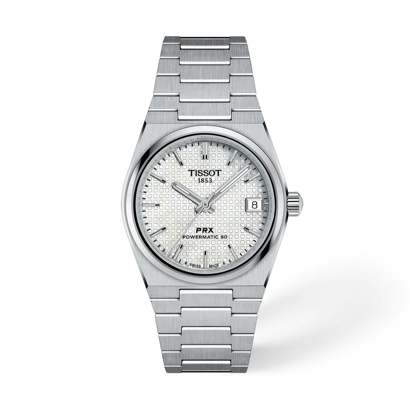 De Tissot PRX T1372071111100 is een elegante polshorloge met een automatisch Zwitsers uurwerk. Het heeft een zilverkleurige tonneauvormige kast van roestvrij staal, een witte wijzerplaat met streepindex en een saffierglas. Dit horloge is waterbestendig tot 10 bar en anti-allergisch. Het draagt comfortabel op de pols dankzij de stalen band van 11 mm breed. Ideaal voor dagelijks gebruik.