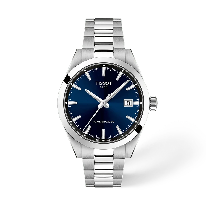  Tissot Stalen Horloge Gentleman (modelnummer: T1658071104100) heeft een zilverkleurige roestvrijstalen kast en band, blauwe wijzerplaat met strepenpatroon, saffierglas en automatische Zwitserse uurwerk. Zijn diameter is 38 mm. Draag dit elegante horloge tijdens formele gelegenheden of zakelijke bijeenkomsten voor een stijlvolle en verfijnde uitstraling. 
