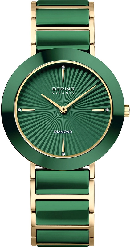 Dit exclusieve Bering Ceramic dameshorloge (11435-738) combineert minimalistisch Deens design met hoogwaardige materialen. Het horloge is uitgevoerd met een slanke edelstalen kast in een goudkleurige tint en een krasbestendige, diepgroene keramische lunette. De opvallende groene wijzerplaat met zonnestraal-structuur is verfijnd bezet met subtiele diamanten als indexen. Uitgerust met ultra-krasvast saffierglas en een schakelband van goudkleurig staal en groen high-tech keramiek.