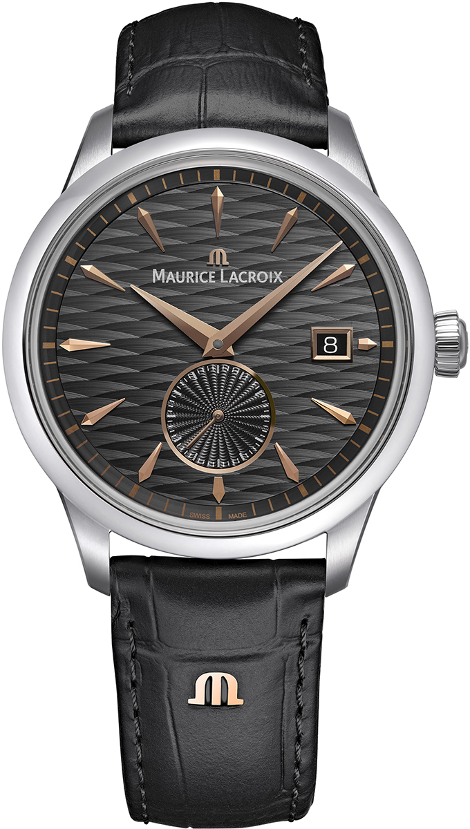 De Maurice Lacroix 1975 Automatic Legacy Edition, model 756207-SS001-330-2, is een elegant polshorloge met een automatisch Zwitsers uurwerk, datumfunctie en analoge aanduiding. Het horloge heeft een roestvrijstalen kast met saffierglas, een grijze wijzerplaat, en een zwarte leren band met studs. Draag het als stijlvol accessoire bij zowel formele als casual outfits.

Limited Edition of 500st.