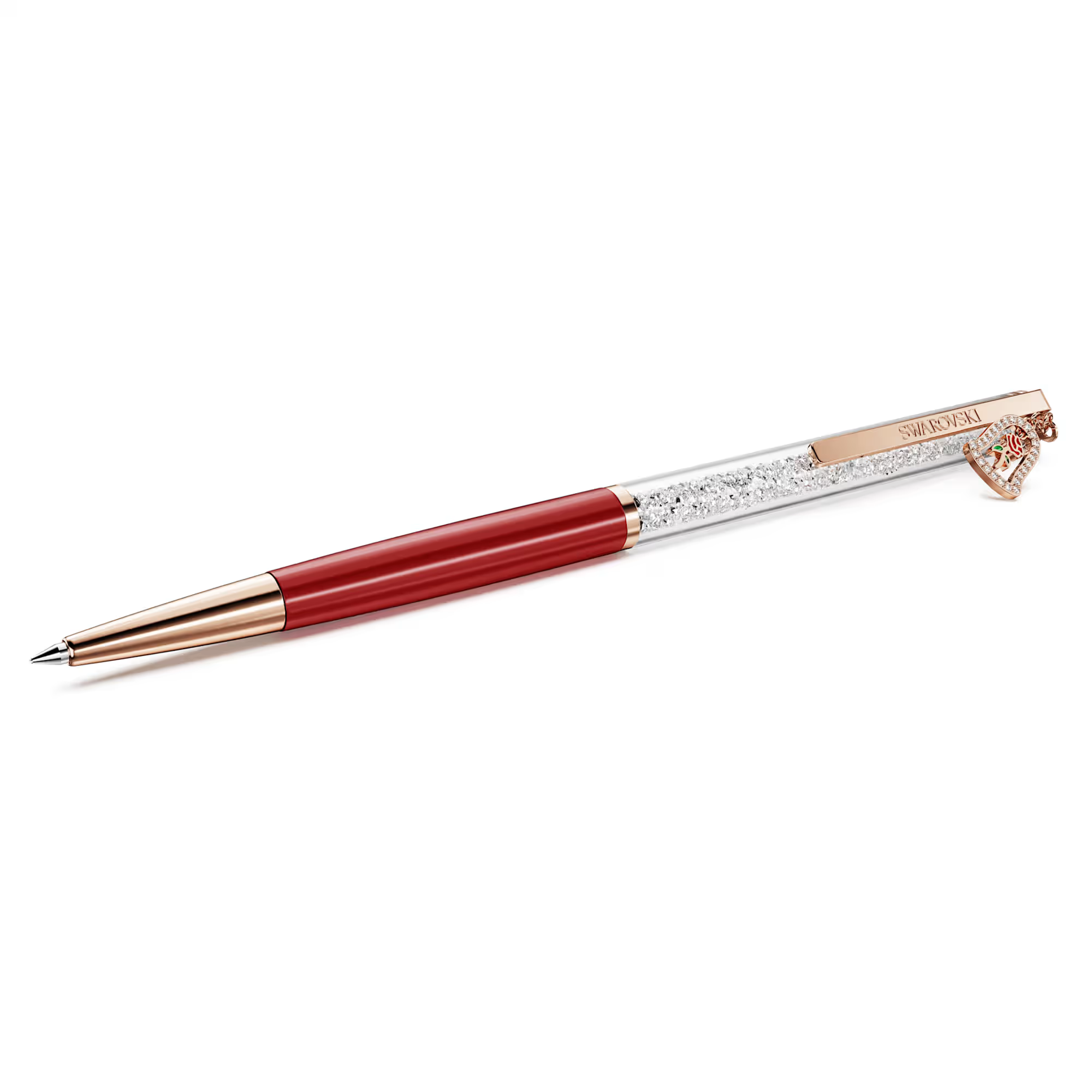 eschrijving
Deze Swarovski-pen is ge&iuml;nspireerd op Belle en het Beest en vangt de delicate maar krachtige symboliek van Disney&rsquo;s iconische romantische verhaal. Naast een gelakte rode huls en een ros&eacute;goudkleurige toplaag, is het slanke ontwerp gevuld met ongeveer 400 heldere kristallen die zichtbaar zijn door het lange transparante venster. Er wordt een bedeltje van een betoverde roos in een stolp meegeleverd, wat een van de belangrijkste en meest aangrijpende motieven van het verhaal benadrukt. Navullingen met zwarte en blauwe inkt zijn te koop in de Swarovski-stores.

Artikelnr.: 5754639
Collectie:  Crystalline
Formaat: 14.5 x 0.9 cm
Auteursrecht:  &copy; Disney
Materiaal:  Kristallen, Rood gelakt, Ros&eacute;goudkleurige toplaag
Kleur:  Rood
Inktkleur:  Zwart
