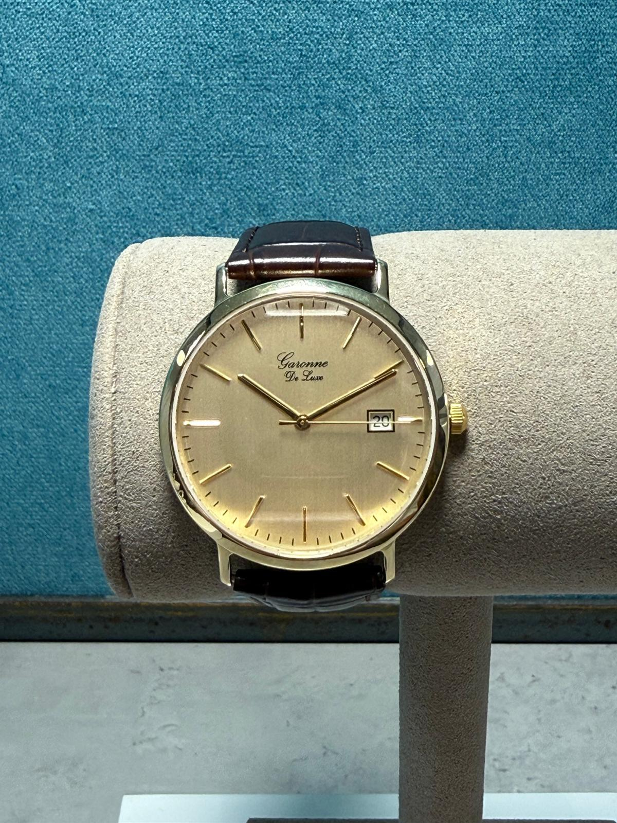 Gouden heren horloge bruin lederen band