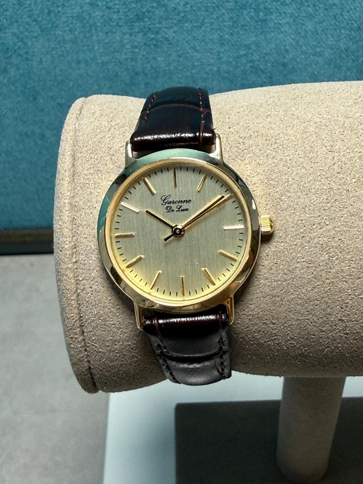Gouden heren horloge bruin leren band