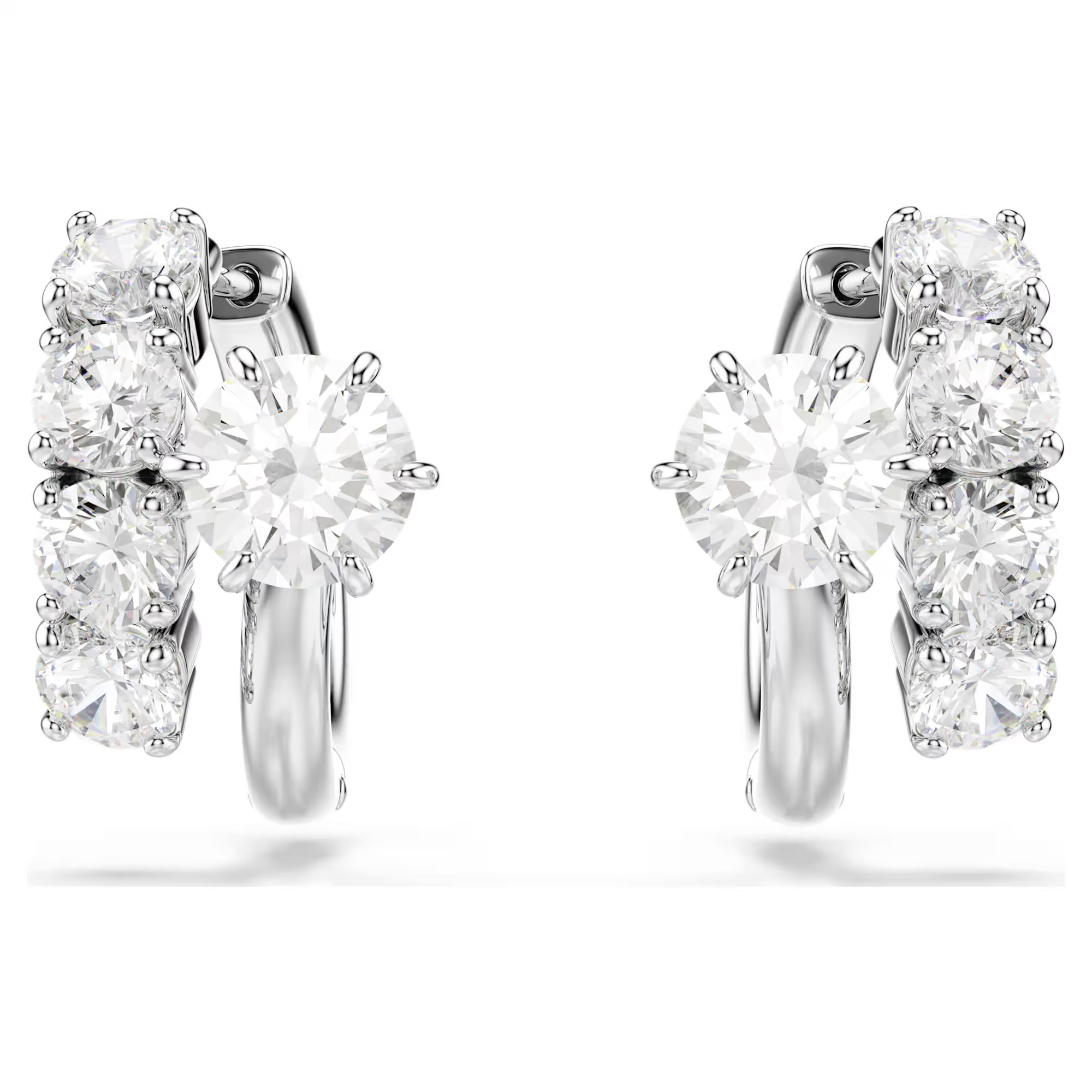 Deze Matrix-oorbellen voor gaatjes zien eruit als prachtige spiralen van licht en zijn voorzien van ronde Swarovski Zirkonia die je dagelijkse outfits naar een hoger niveau tillen. Ge&iuml;nspireerd door de organische perfectie van de helix, is Matrix een verfijnd en elegant DNA-ontwerp dat een onverwachte vloeiendheid laat zien dankzij de grenzeloze savoir-faire van Swarovski.