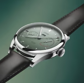 Calibre 113  10 days power reserve green dial