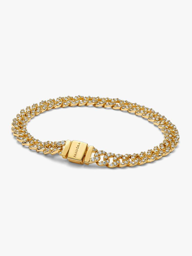 Deze met vergulde sterlingzilveren armband is voorzien van glinsterende schakels. De bovenkant van elke halve cirkel is bezet met drie ronde stenen, terwijl de achterkant van de ketting is gepolijst voor glans en comfort.