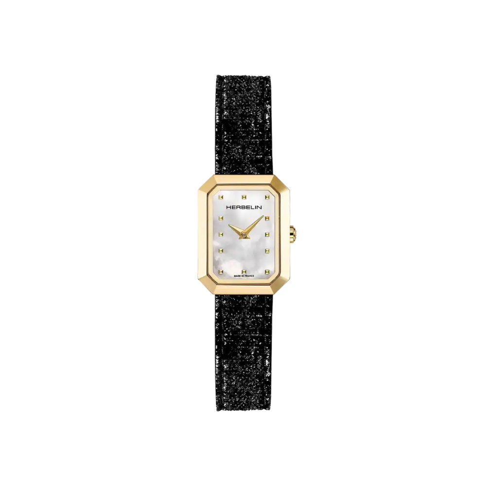 Herbelin Octog&ocirc;ne is een verfijnd dameshorloge met een elegante achthoekige goudkleurige kast, een parelmoeren wijzerplaat en een stijlvol zwart leren bandje. Dankzij het Zwitserse quartz uurwerk, krasbestendig saffierglas en het tijdloze Franse design is dit horloge een perfecte combinatie van luxe en dagelijks draagcomfort.