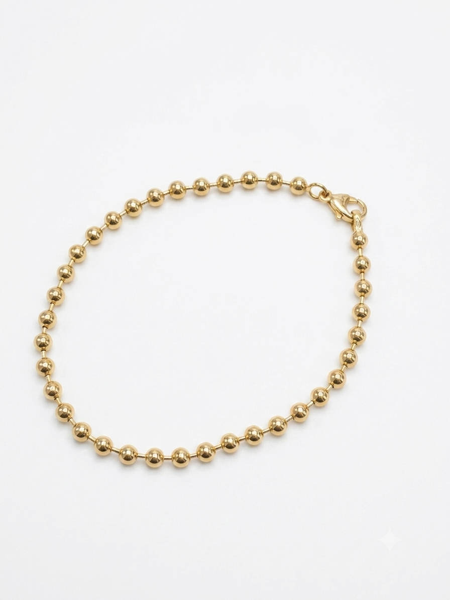 Deze stijlvolle massieve bolletjes armband is vervaardigd uit 14 karaat geelgoud en combineert een verfijnd ontwerp met hoogwaardige kwaliteit. De gelijkmatig gevormde bolletjes geven de armband een elegante, speelse uitstraling die perfect past bij zowel een casual als een chique outfit.

Met een breedte van 4 mm, een lengte van 21 cm en een gewicht van 8,43 gram biedt deze armband een comfortabele pasvorm en een luxe gevoel. Dankzij de massieve uitvoering is de armband duurzaam en geschikt om jarenlang met plezier te dragen.

Draag deze gouden bolletjes armband afzonderlijk voor een subtiele, stijlvolle look of combineer hem met andere gouden sieraden voor een eigentijdse uitstraling. Door het tijdloze ontwerp is deze armband ook een prachtig cadeau voor een bijzondere gelegenheid.

Specificaties

Materiaal: 14 karaat geelgoud
Model: Bolletjes armband
Uitvoering: Massief
Breedte: 4 mm
Lengte: 21 cm
Gewicht: 8,43 gram
Kleur: Geelgoud
Sluiting: Karabijnsluiting