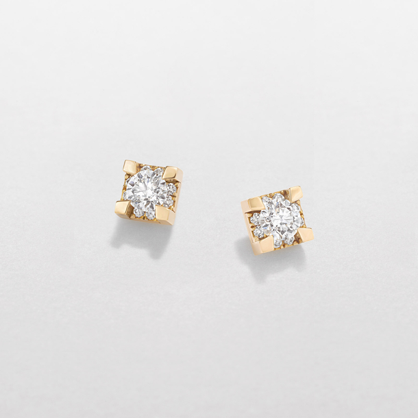 Geel-witgouden oorstekers met diamant.