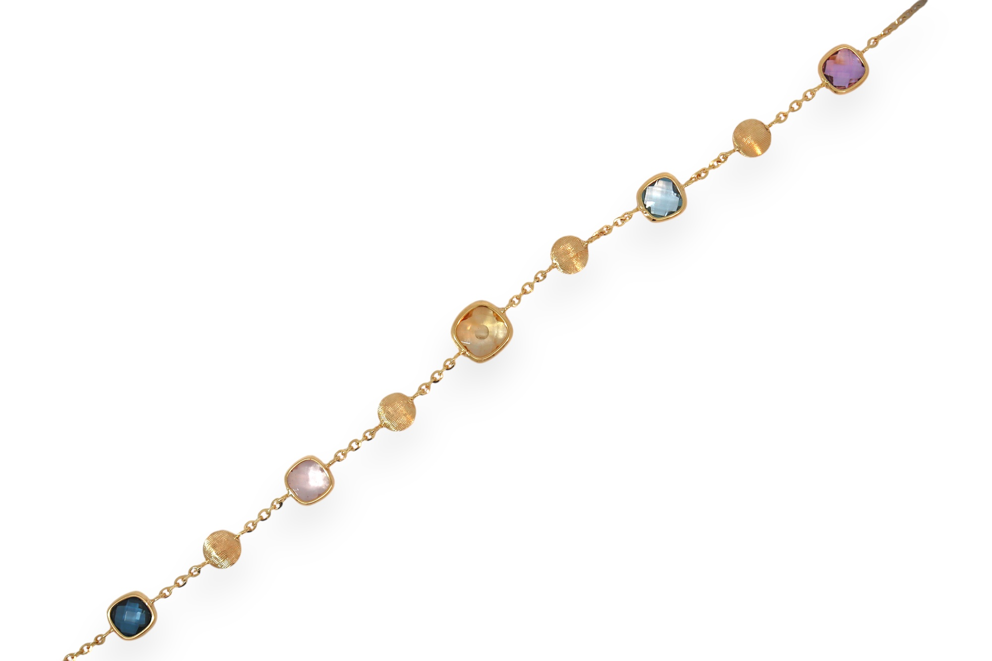 Deze luxueuze armband in 18 kt geelgoud combineert een fijne gouden schakel met zorgvuldig geplaatste kleurstenen in rijke, harmonieuze tinten.
De afwisseling van gefacetteerde stenen en satijnmatte gouden elementen geeft het juweel een speelse maar bijzonder verfijnde uitstraling.
Een elegante armband met een vrouwelijke touch, perfect om kleur en klasse toe te voegen aan elke look.
