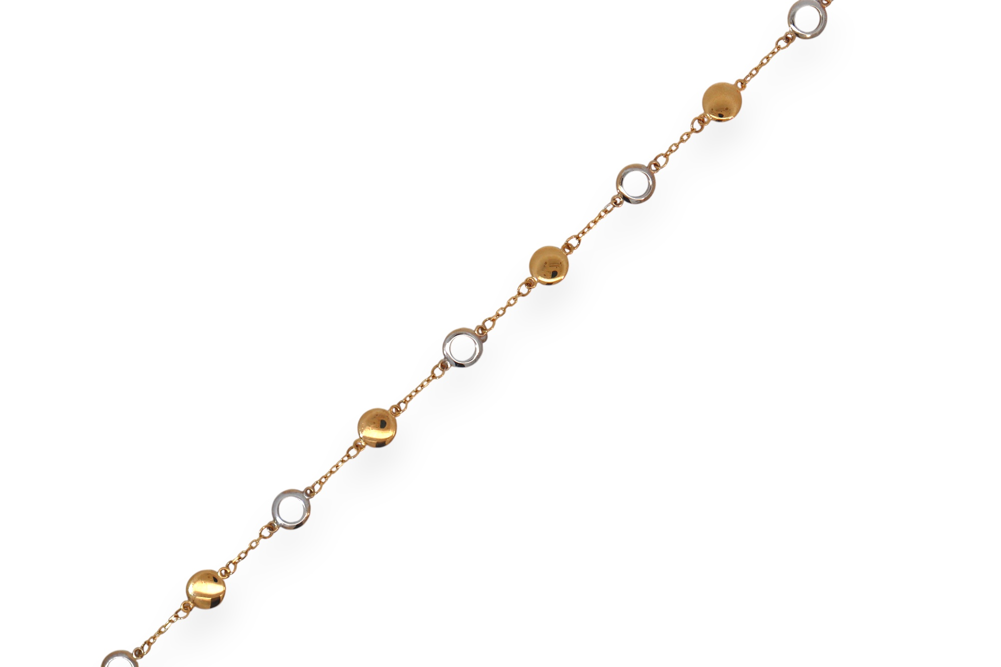 Deze elegante armband in 18 kt geelgoud en witgoud combineert een fijne gouden schakel met speelse ronde elementen.
De afwisseling van glanzende geelgouden bolletjes en witgouden cirkelaccenten geeft het juweel een moderne, luxueuze uitstraling.
Een verfijnde armband die licht draagt en perfect is om dagelijks stijlvol te combineren met andere gouden juwelen.