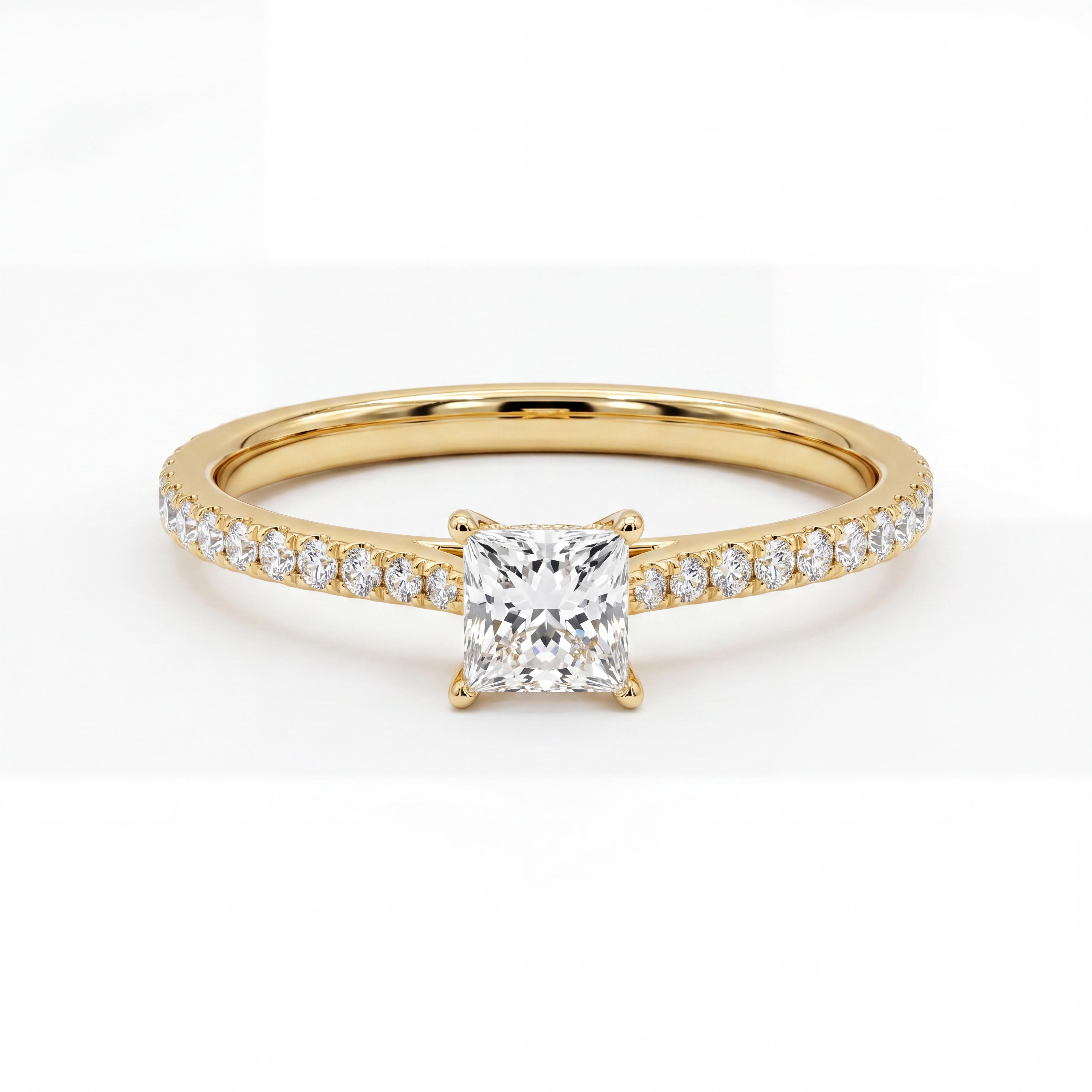 Handgemaakte 14 Karaat Gouden Verlovingsring met Princess Cut Lab Grown Diamant en Pav&eacute; Band (Inclusief IGI-certificaat)

Ben je op zoek naar de ultieme verlovingsring die tijdloze elegantie, adembenemende schittering en modern vakmanschap perfect combineert? Deze exclusieve, **handgemaakte 14 karaat gouden verlovingsring** is ontworpen om een leven lang te stralen. Met een schitterende **princess cut lab grown diamant** als stralend middelpunt en een verfijnde pav&eacute;-gezette band, is dit het perfecte symbool voor jullie liefde.

Een Meesterwerk van Slijpvorm en Zuiverheid
Het middelpunt van deze ring is een prachtige princess cut (vierkant geslepen) lab-grown diamant van **0.34 karaat**. Met een **D-kleur** (volkomen kleurloos, de allerhoogste kleurgradatie) en een **VVS2-zuiverheid** (zeer, zeer kleine insluitsels, nagenoeg onzichtbaar voor het blote oog) ben je verzekerd van een uitzonderlijk vuur en een heldere schittering. 

Om de uitzonderlijke kwaliteit van de centrale diamant te garanderen, wordt deze ring geleverd met een officieel en wereldwijd erkend **IGI diamanten certificaat**. Dit geeft je de absolute zekerheid over de echtheid, slijpkwaliteit, kleur en zuiverheid van de diamant.

De band is subtiel ingelegd met een fonkelende pav&eacute;-zetting van in totaal **0.13 karaat** aan lab-grown diamanten, wat de ring een totale diamantwaarde van maar liefst **0.47 karaat** geeft.

Handgemaakt, Duurzaam en Massief
Elke ring wordt met de Hand vervaardigd van hoogwaardig, massief 14 karaat goud. Dankzij het solide en doordachte ontwerp is deze ring uitermate geschikt voor dagelijks gebruik, zonder in te leveren op elegantie. De stevige zetting beschermt de princess cut diamant optimaal, zodat de ring generaties lang mooi blijft.

Kiezen voor een lab-grown diamant betekent kiezen voor een ethisch, milieuvriendelijk en conflictvrij alternatief, met exact dezelfde chemische, fysieke en optische eigenschappen als een gedolven diamant. 

---

Belangrijkste specificaties:
*   **Materiaal:** 14 karaat massief goud (beschikbaar in geelgoud / witgoud / roodgoud)
*   **Stijl:** Klassieke verlovingsring met pav&eacute;-band
*   **Centrale steen:** Lab-grown diamant (Princess cut / vierkant)
*   **Gewicht centrale steen:** 0.34 karaat
*   **Kleur & Zuiverheid:** D / VVS2 (Topkwaliteit)
*   **Certificaat:** Officieel IGI diamanten certificaat meegeleverd
*   **Zijstenen:** Pav&eacute;-gezette lab-grown diamanten (totaal 0.13 karaat)
*   **Totaal diamantgewicht:** 0.47 karaat
*   **Productie:** Volledig handgemaakt in eigen atelier
*   **Geschikt voor:** Dagelijks dragen (duurzaam en massief)
*   **Luxe verpakking:** Inclusief luxe ringendoos, klaar voor het aanzoek