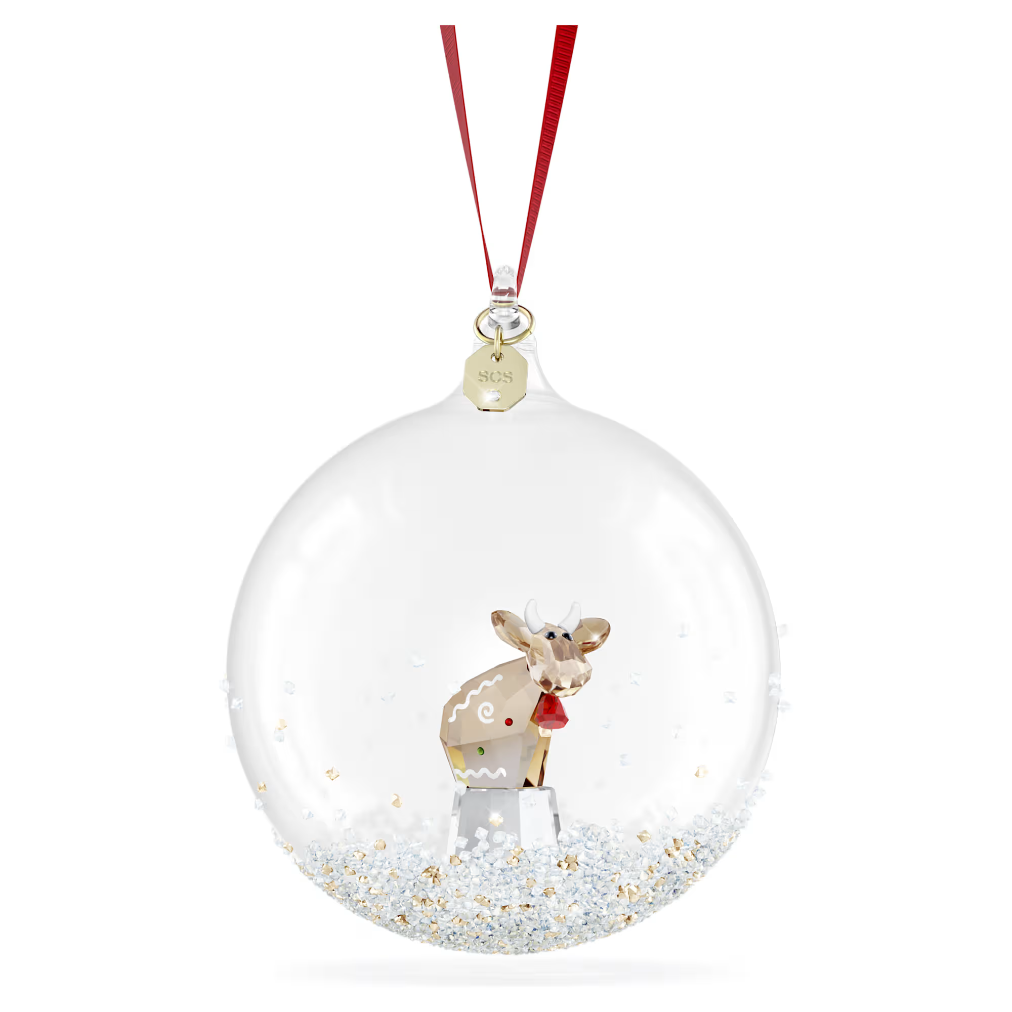 Dit Jaarlijkse Editie-ornament Kerstbal is exclusief voor SCS-leden en zet een van de meest geliefde personages van Swarovski in de schijnwerpers. De glazen bal heeft aangebrachte Crystal Rocks aan de onderkant en hangt aan een rood ripsband lint. In het midden ziet u een miniatuurversie van Mo in de kleur Golden Shadow, wat het ontwerp een vrolijke en speelse uitstraling geeft. Deze bal, met 202 facetten, is afgewerkt met een metalen label met een champagnegoudkleurige toplaag waarop het jaartal is gegraveerd. Decoratief voorwerp. Geen speelgoed. Niet geschikt voor kinderen jonger dan 15 jaar.

Artikelnr.: 5732813
Collectie:  SCS
Formaat: 10 x 8 x 8.4 cm
Ontwerper:  Parichehr Shirazi
Materiaal:  Kristallen, Metaal met goudkleurige afwerking, Polyester, Glas
Kleur:  Meerkleurig
SCS-jaarcollectie:  2026