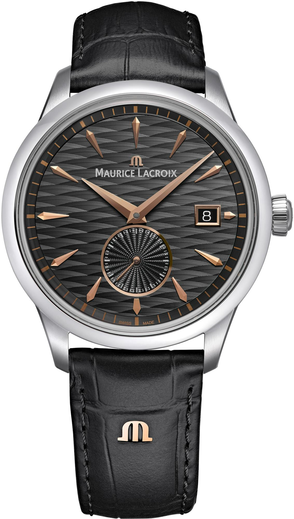 De Maurice Lacroix 1975 Automatic Legacy Edition, model 756207-SS001-330-2, is een elegant polshorloge met een automatisch Zwitsers uurwerk, datumfunctie en analoge aanduiding. Het horloge heeft een roestvrijstalen kast met saffierglas, een grijze wijzerplaat, en een zwarte leren band met studs. Draag het als stijlvol accessoire bij zowel formele als casual outfits.

Limited Edition of 500st.